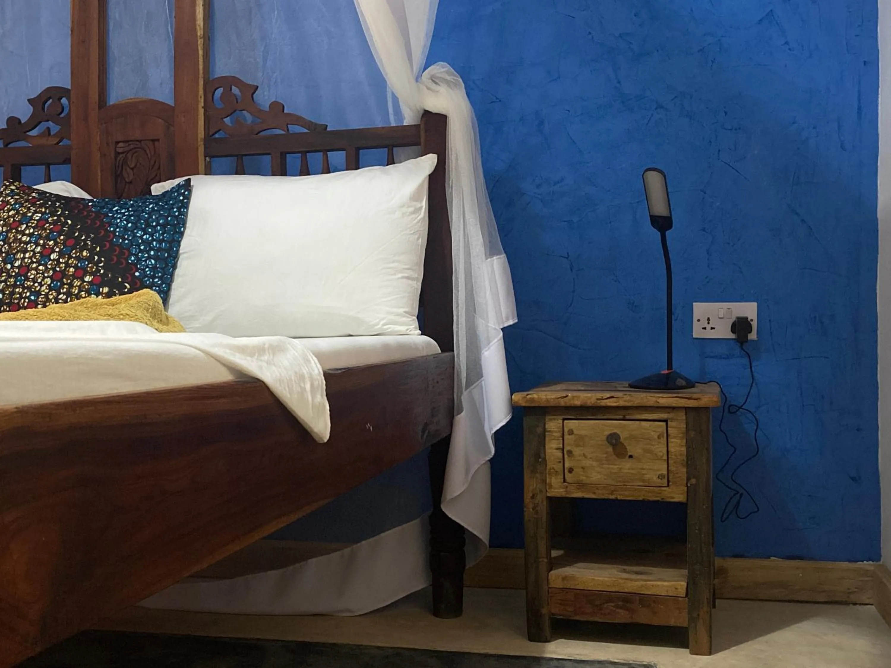 Bed in Mbuyuni Beach Village