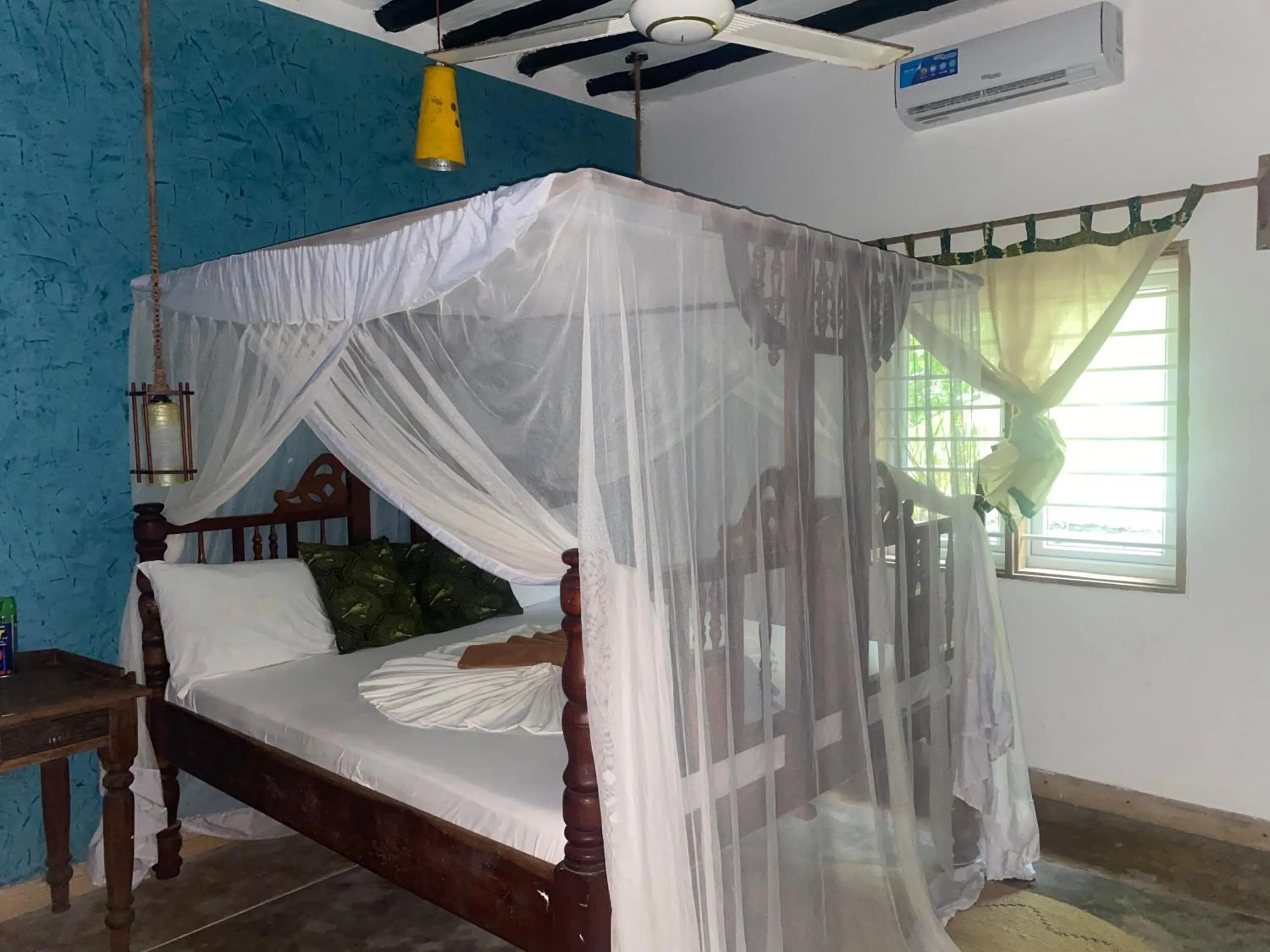 Bed in Mbuyuni Beach Village