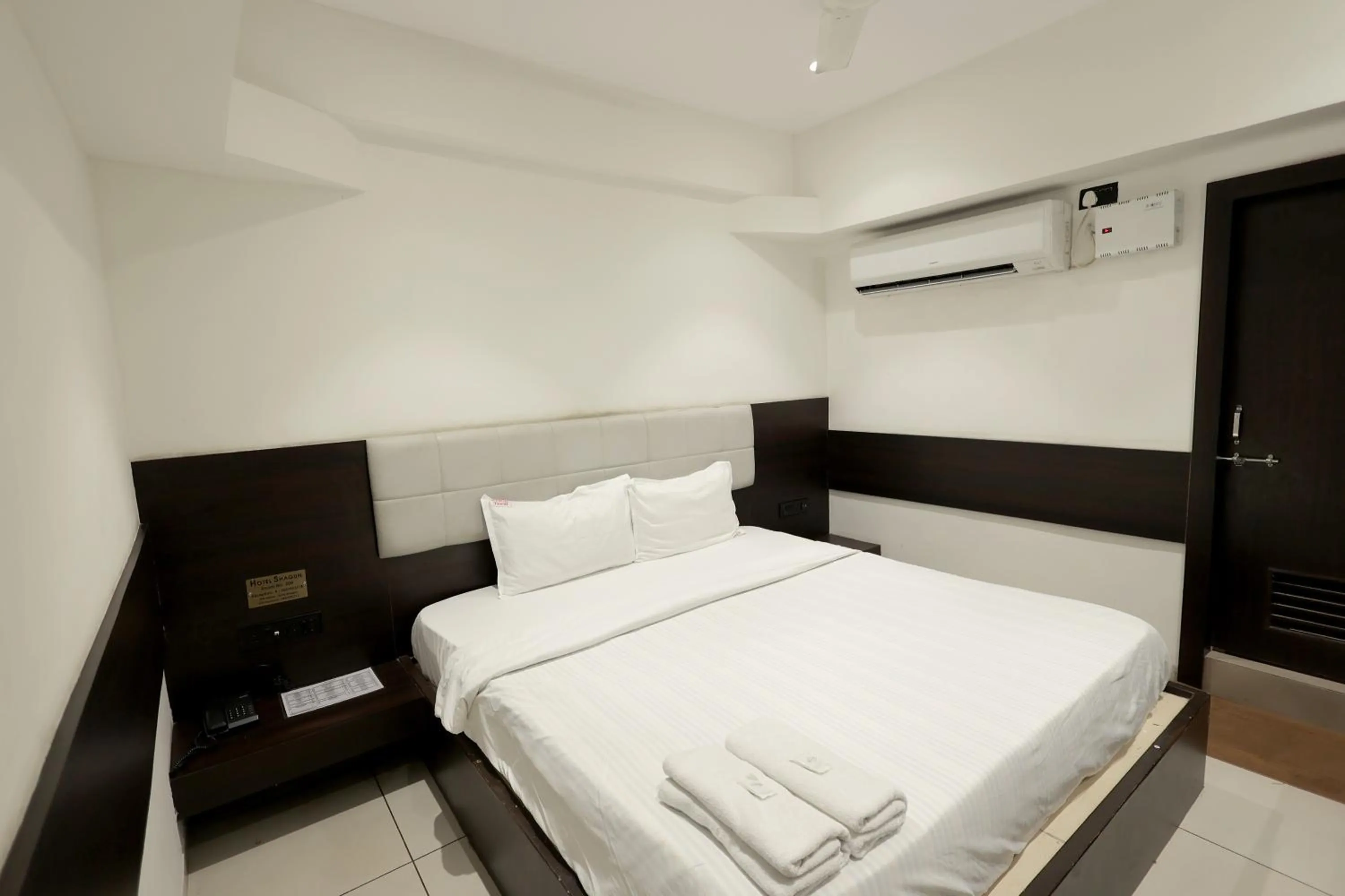 Bedroom in Hotel Shagun, Piplod City Centre Surat