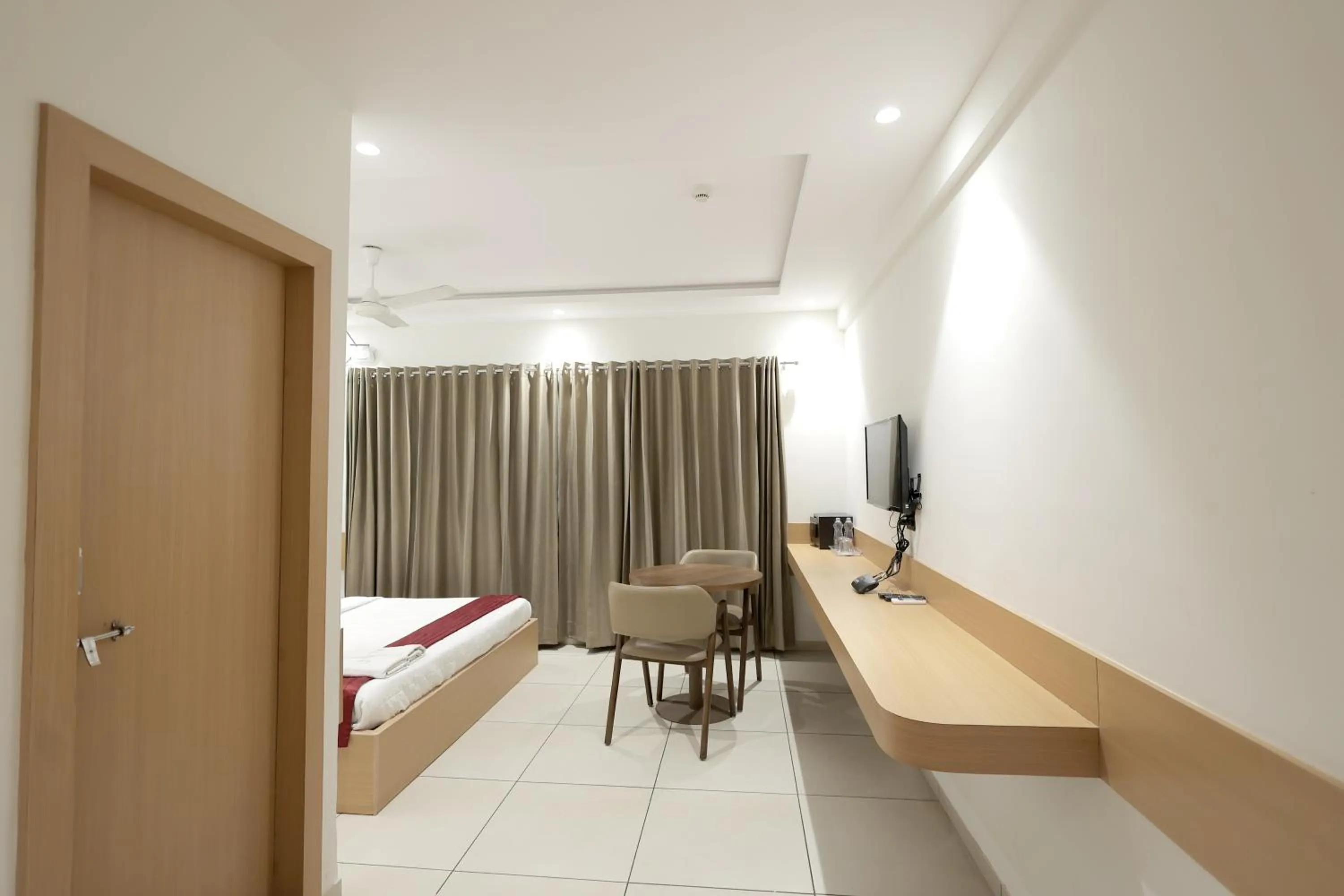 Photo of the whole room in Hotel Shagun, Piplod City Centre Surat