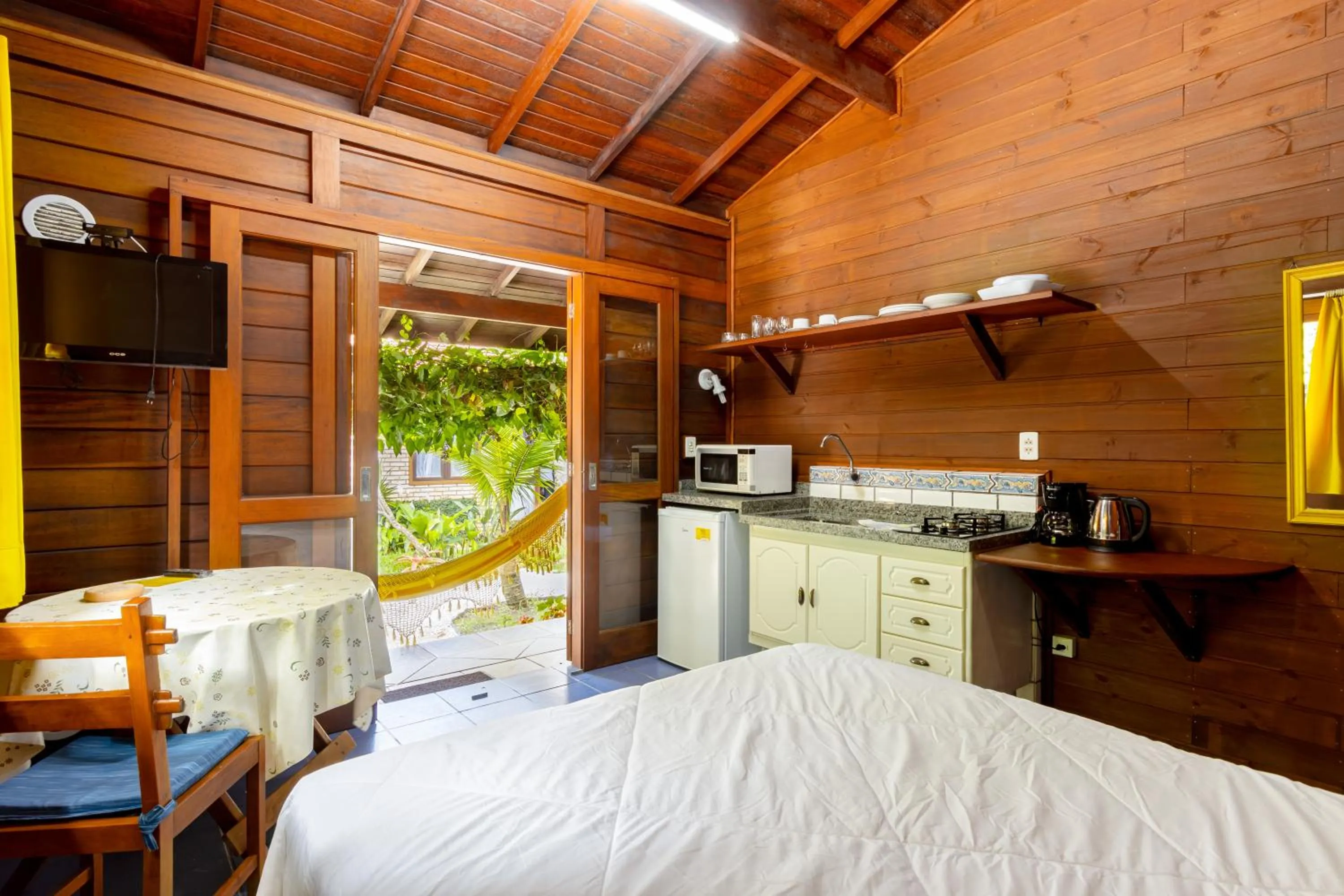 Kitchen or kitchenette, Bed in Pousada Don Pablo