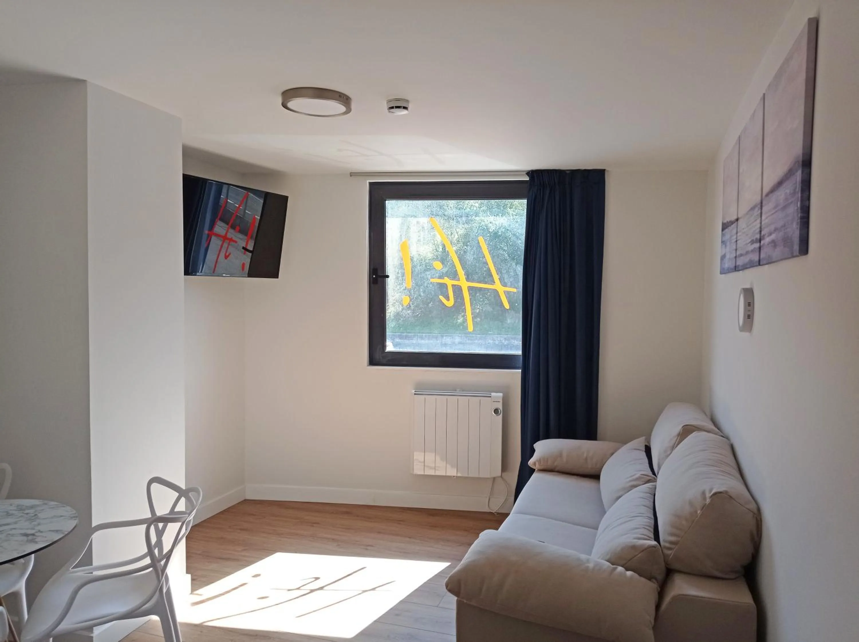 Living room in Apartamentos Hi Apartaments Santander 3000