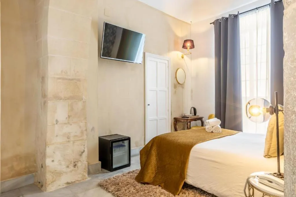 Bedroom, Bed in Catedral Suites Jerez