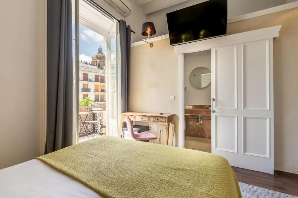 Bedroom, Bed in Catedral Suites Jerez