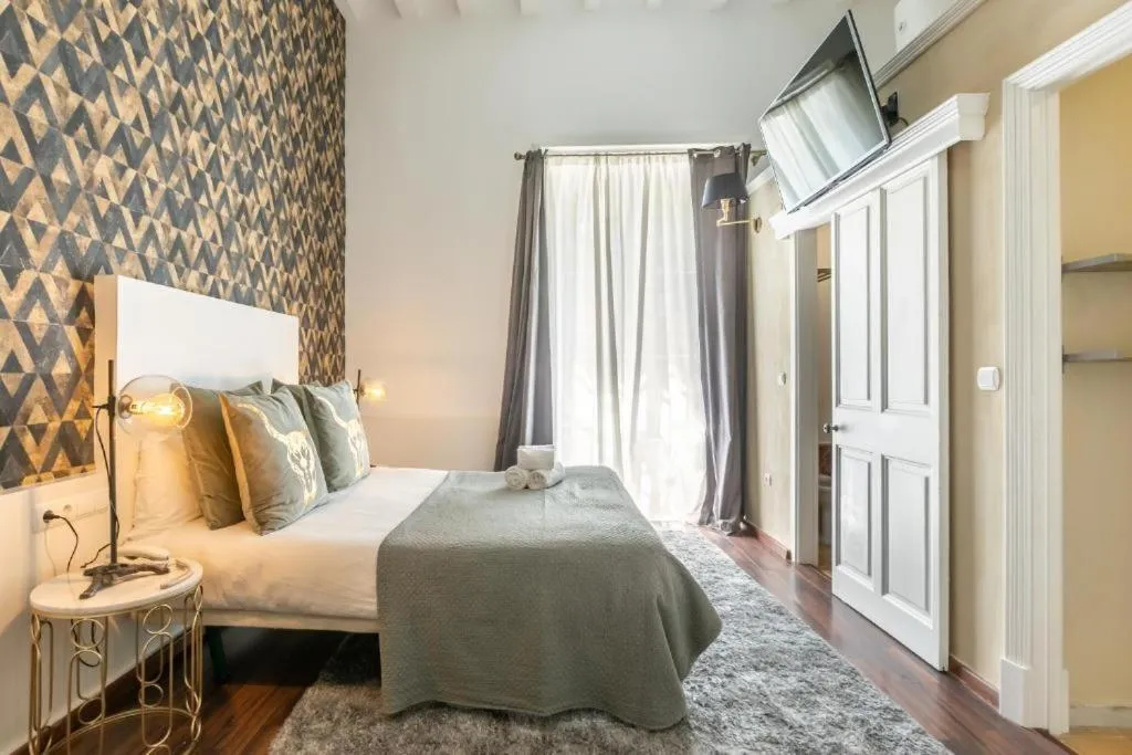 Bed in Catedral Suites Jerez