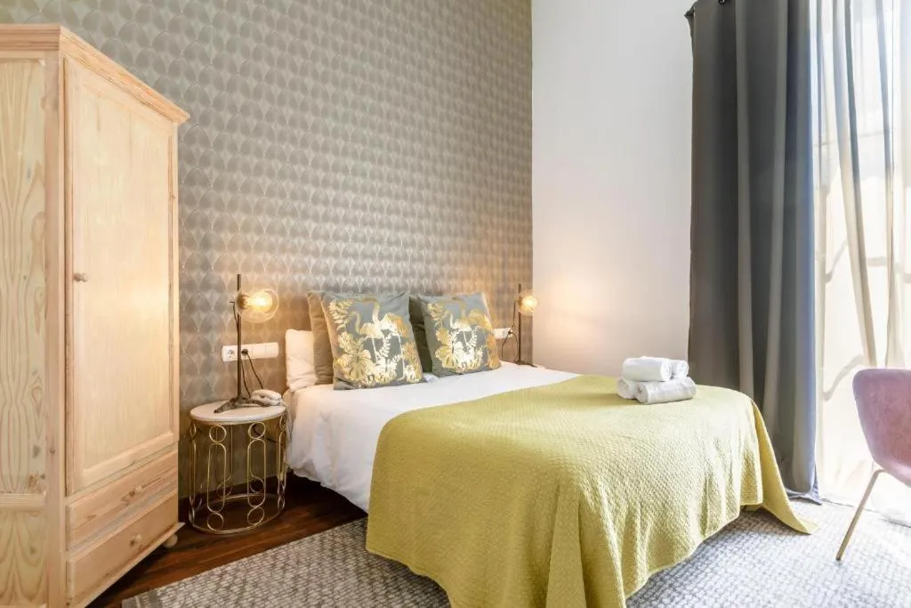 Bed in Catedral Suites Jerez