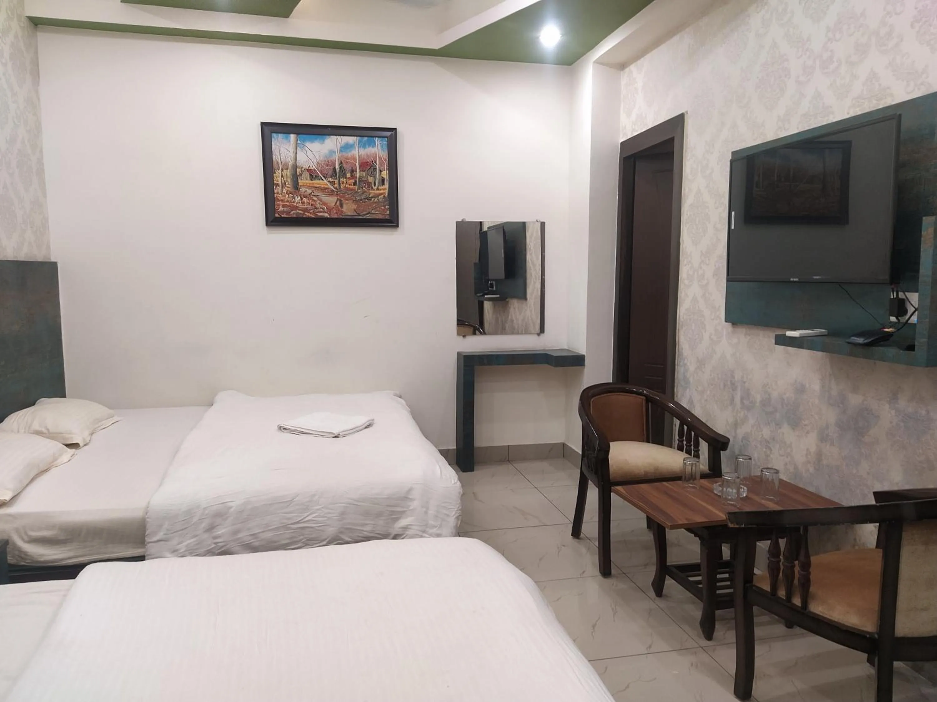 Bedroom, Bed in Hotel Geeta Residency Haridwar