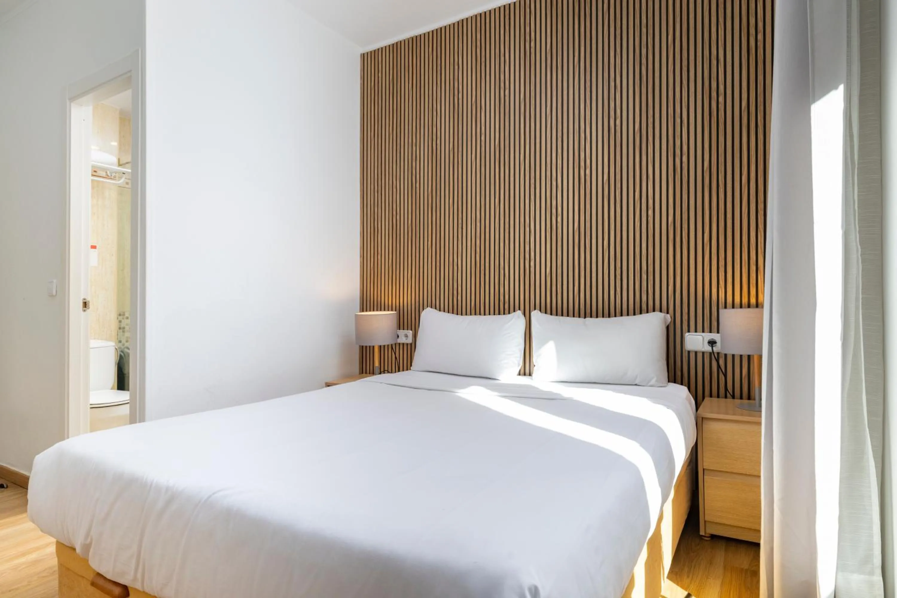 Bedroom, Bed in H-A San Mateo Suites