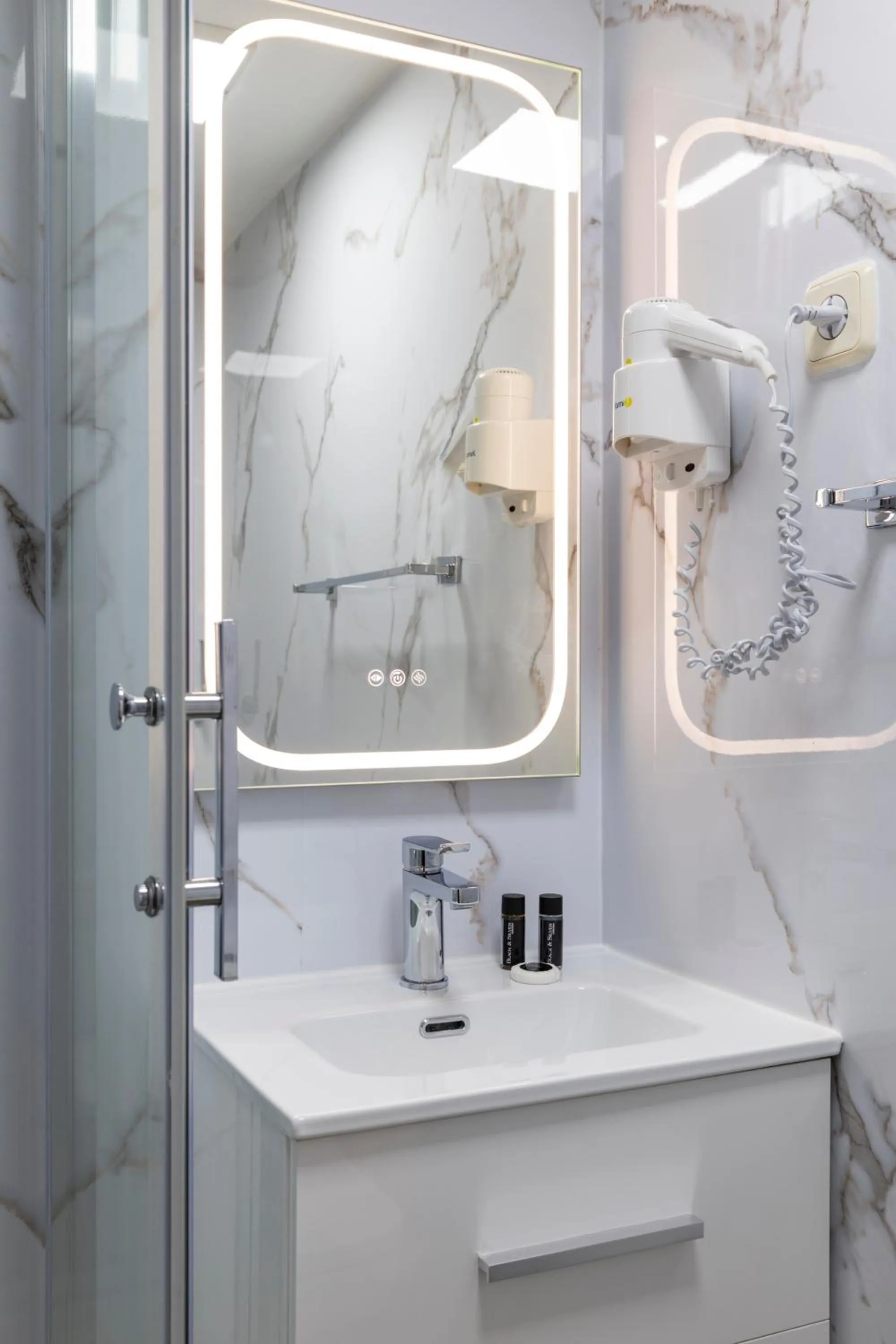 Bathroom in H-A San Mateo Suites