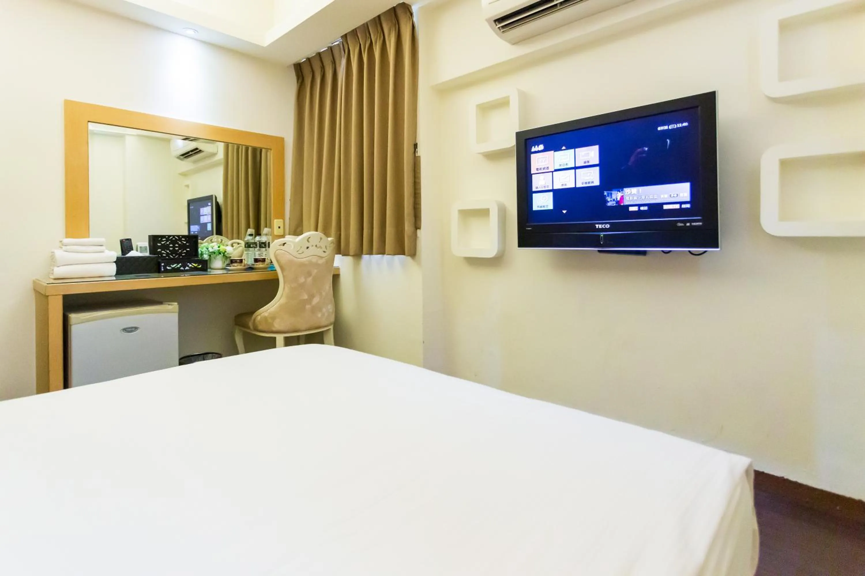 Bed in Newrise Hotel