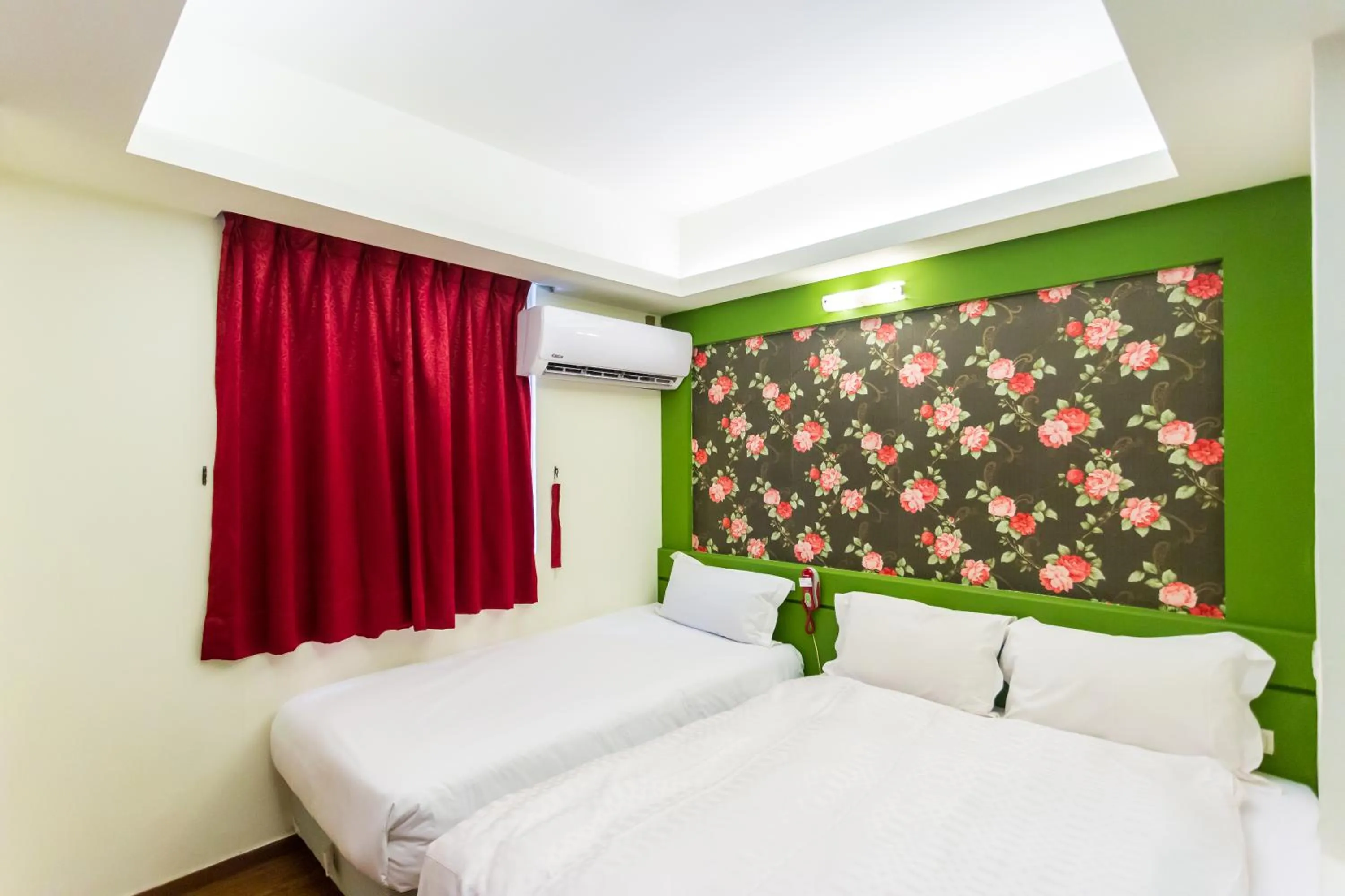 Bed in Newrise Hotel