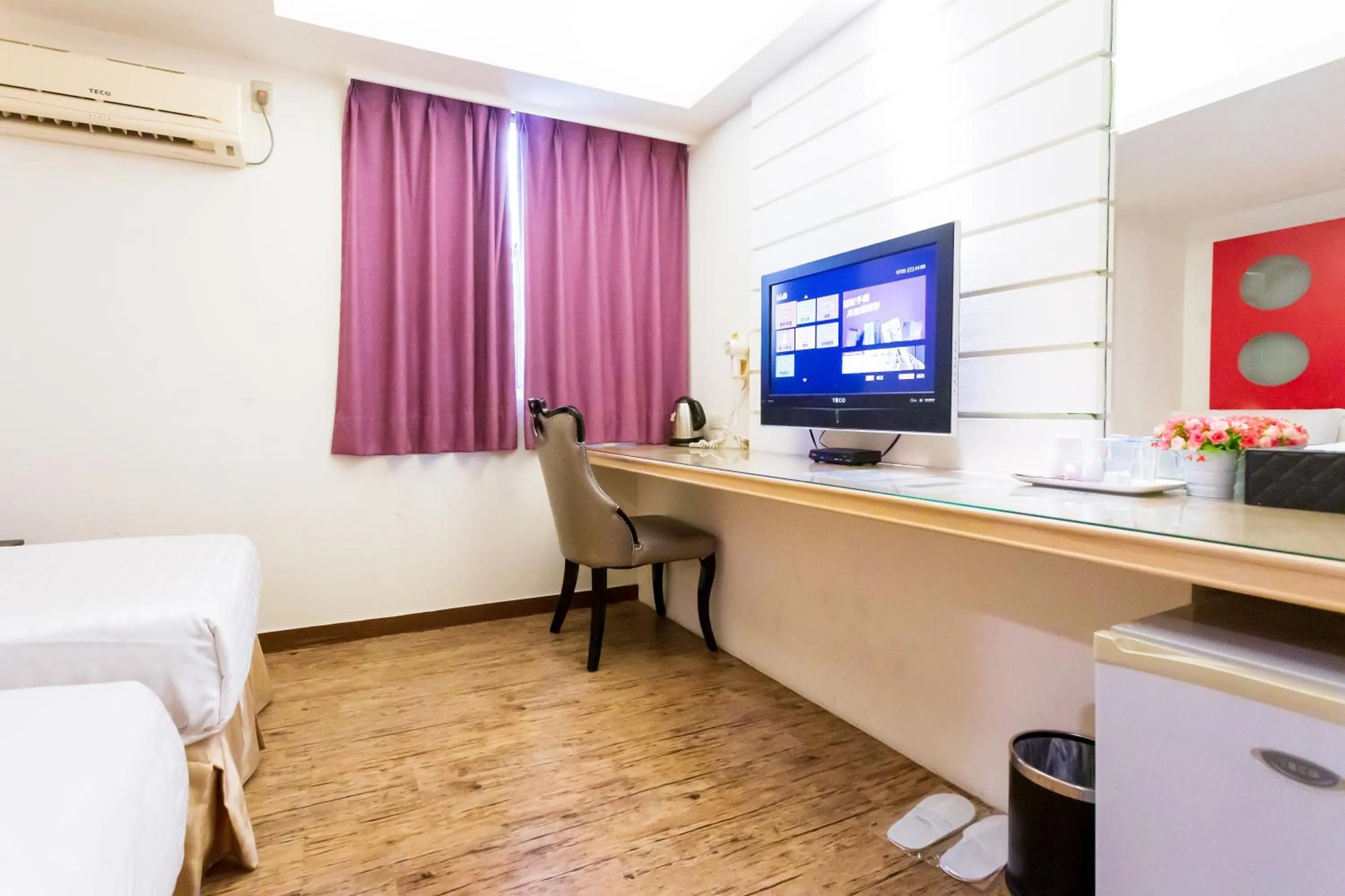 Photo of the whole room in Newrise Hotel