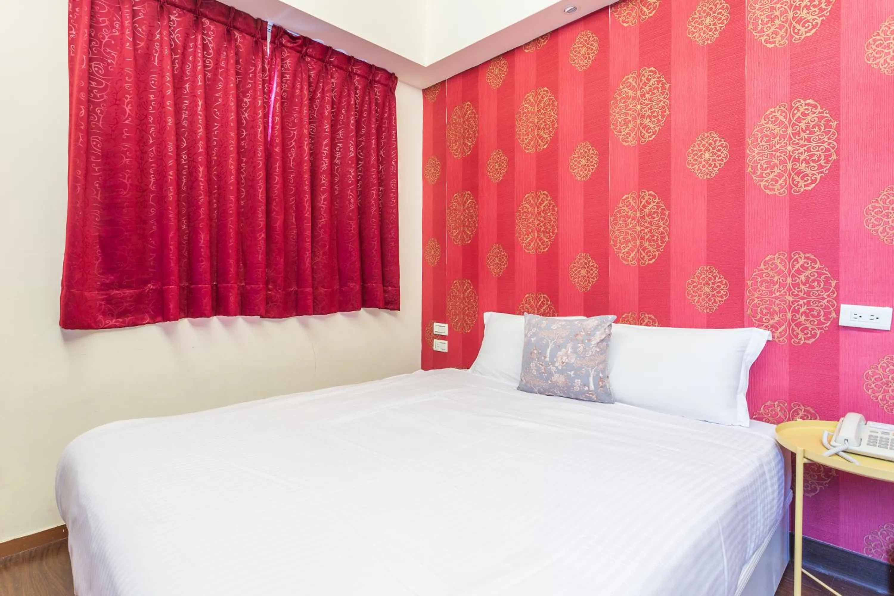 Bed in Newrise Hotel