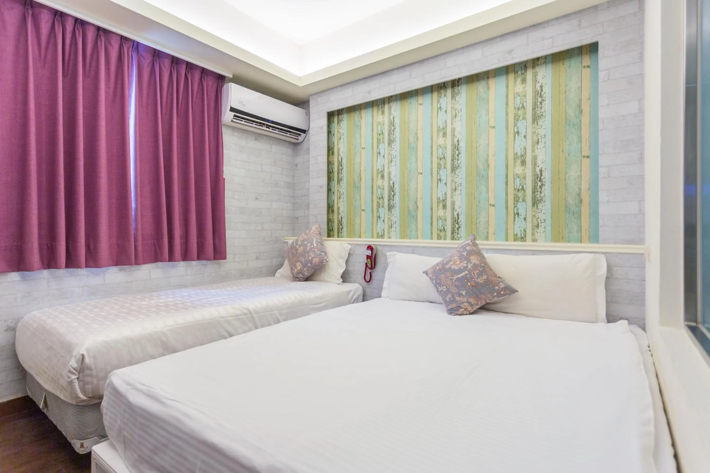 Bed in Newrise Hotel