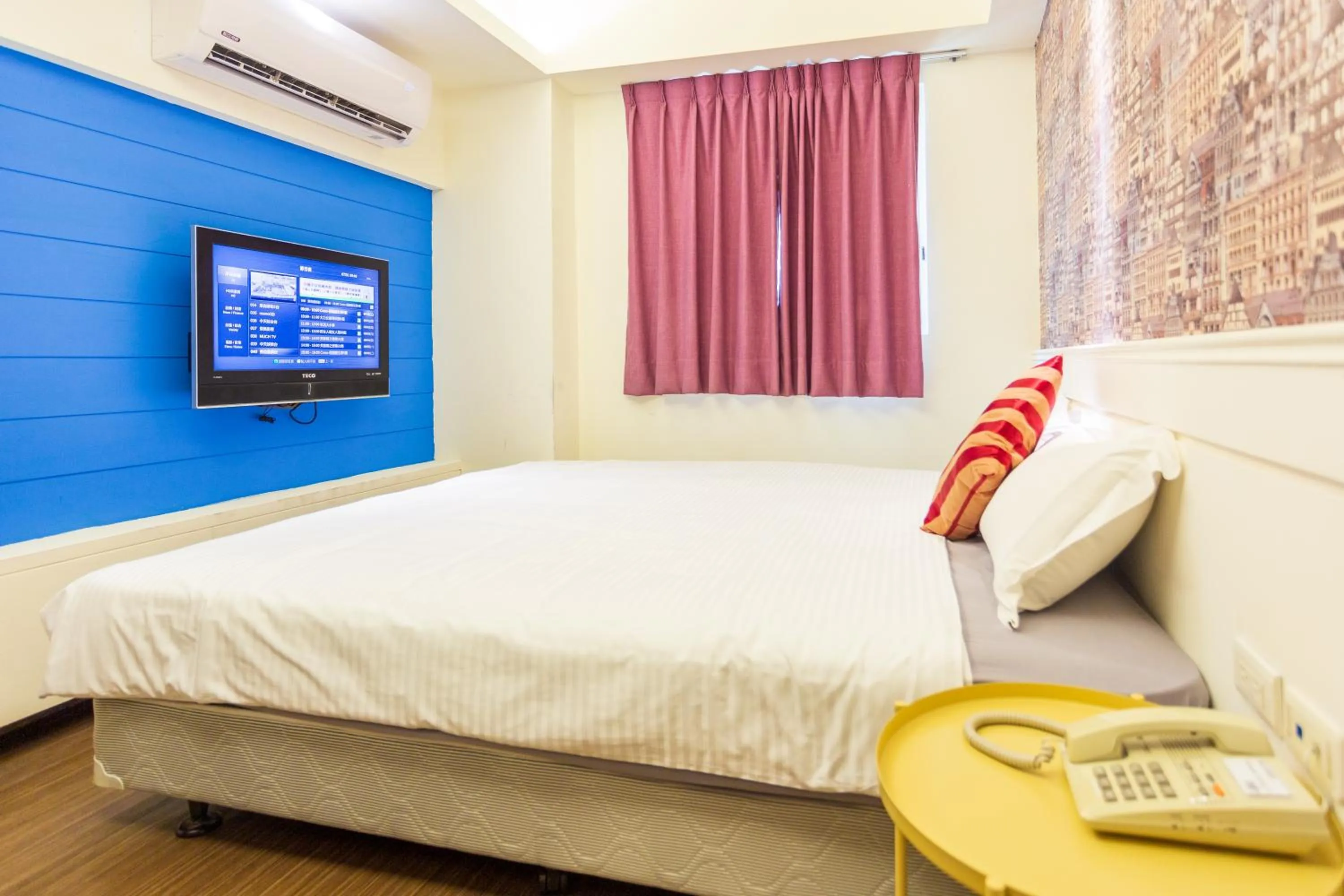 Bed in Newrise Hotel