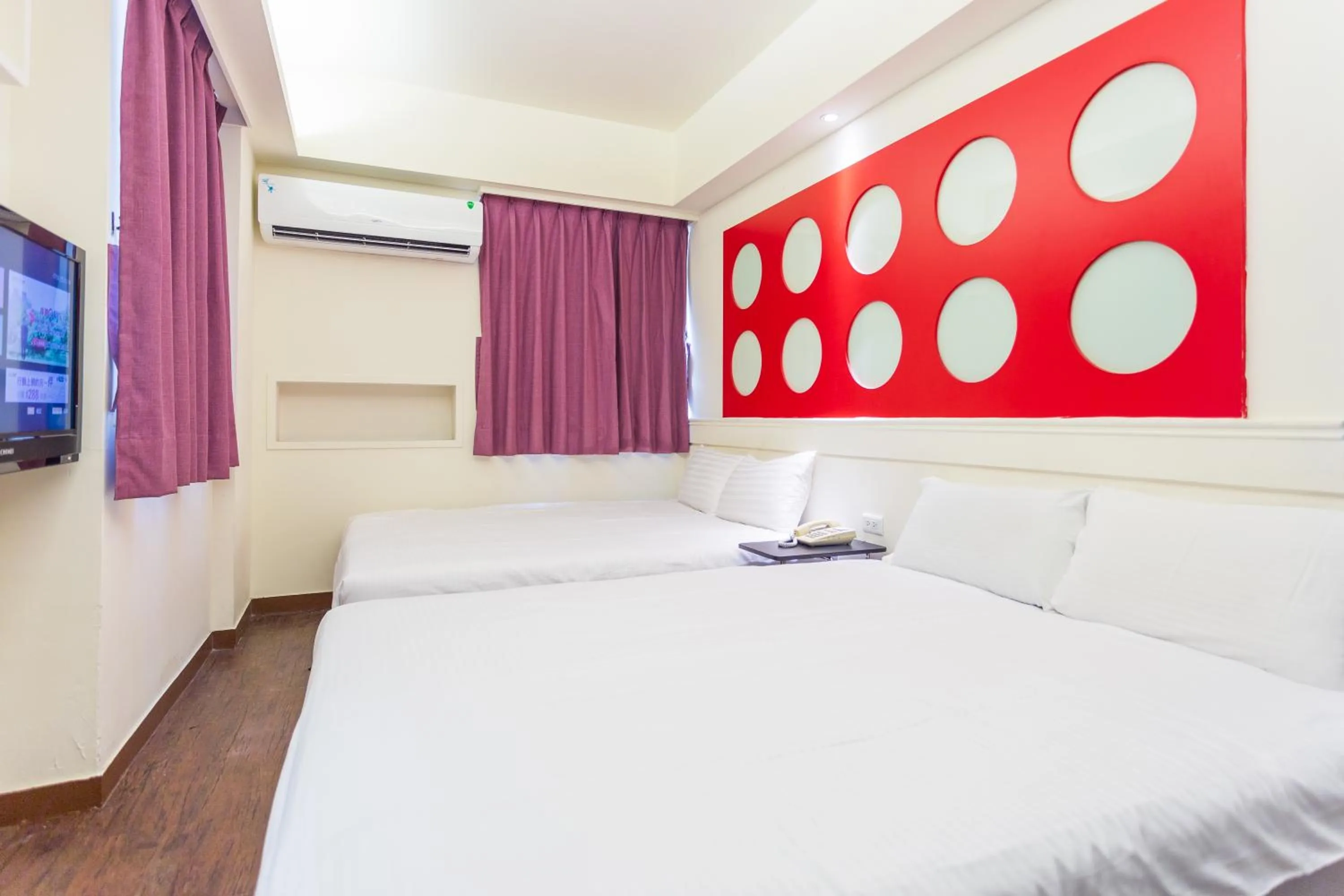 Photo of the whole room, Bed in Newrise Hotel