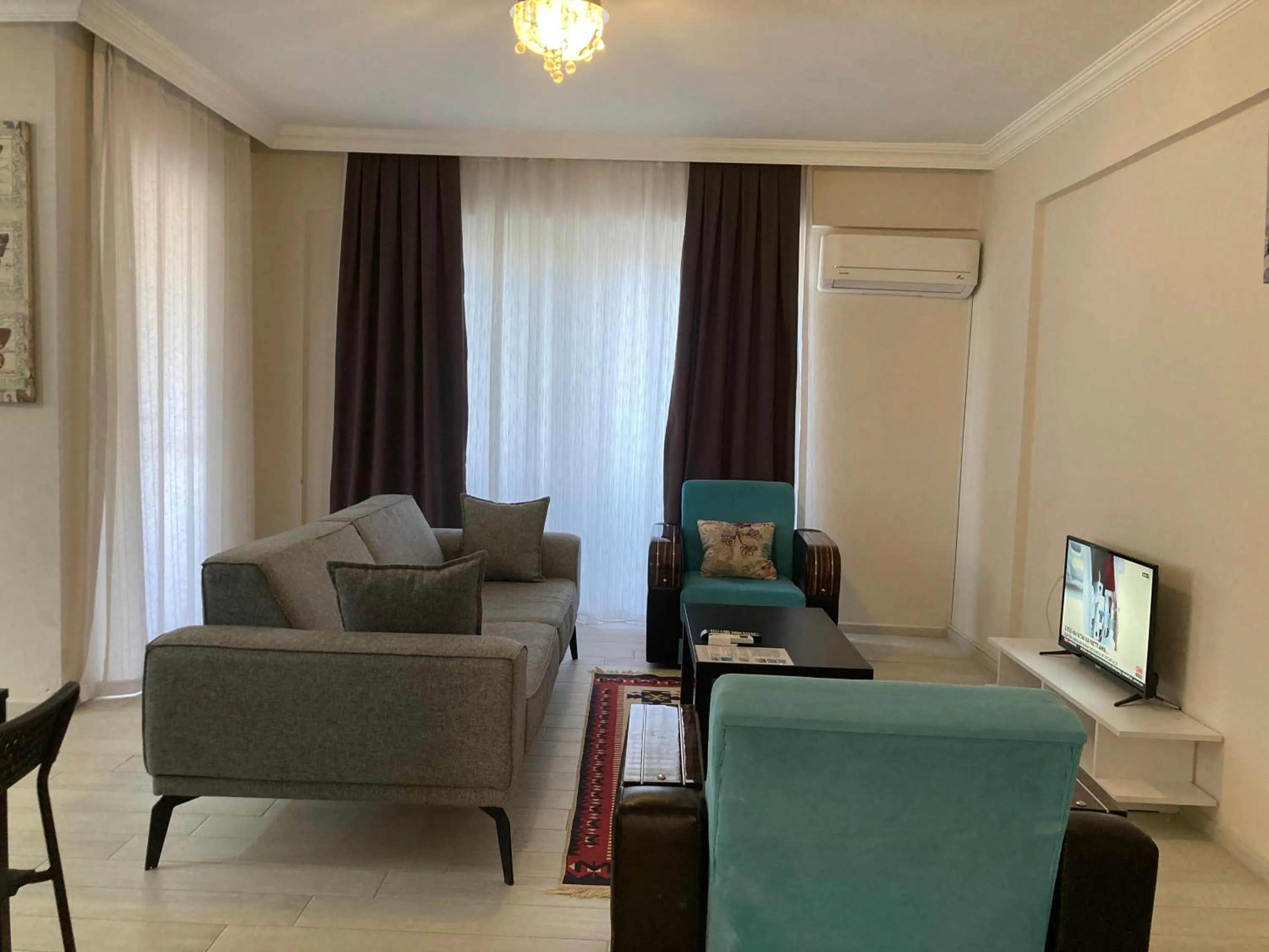 TV and multimedia in Dalaman Pansiyon & Family rooms