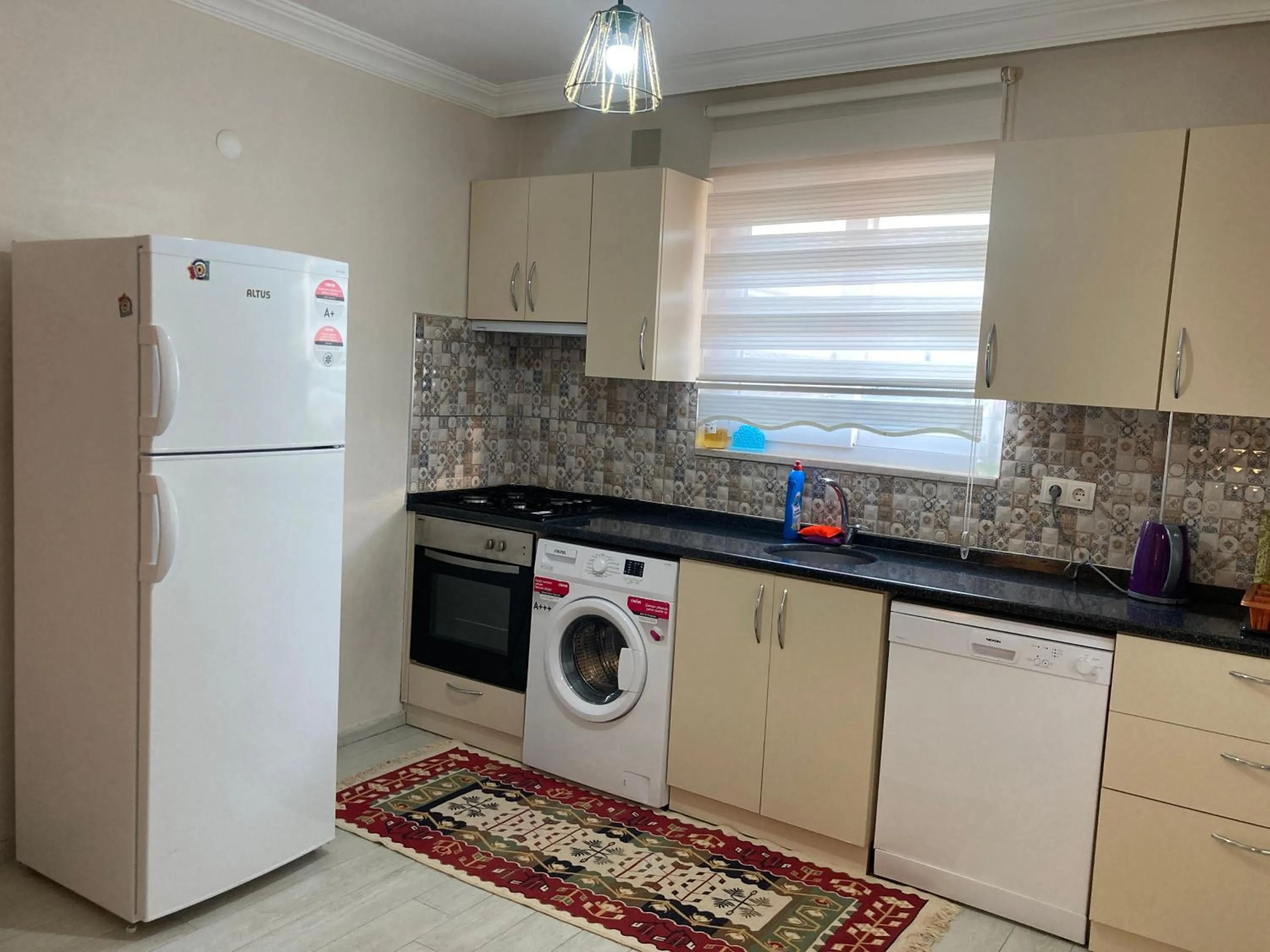 Kitchen or kitchenette in Dalaman Pansiyon & Family rooms