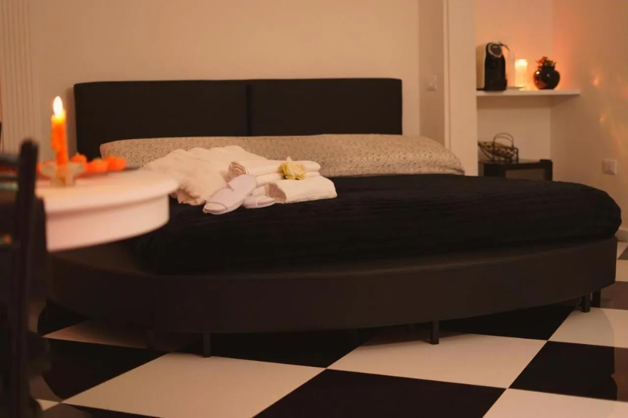 Bed in Alchimia Luxury Suites