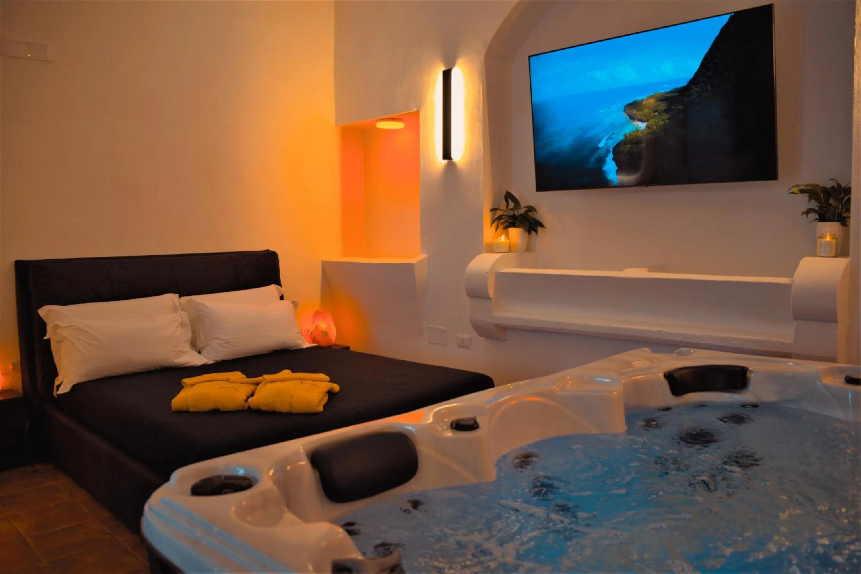 Bed in Alchimia Luxury Suites