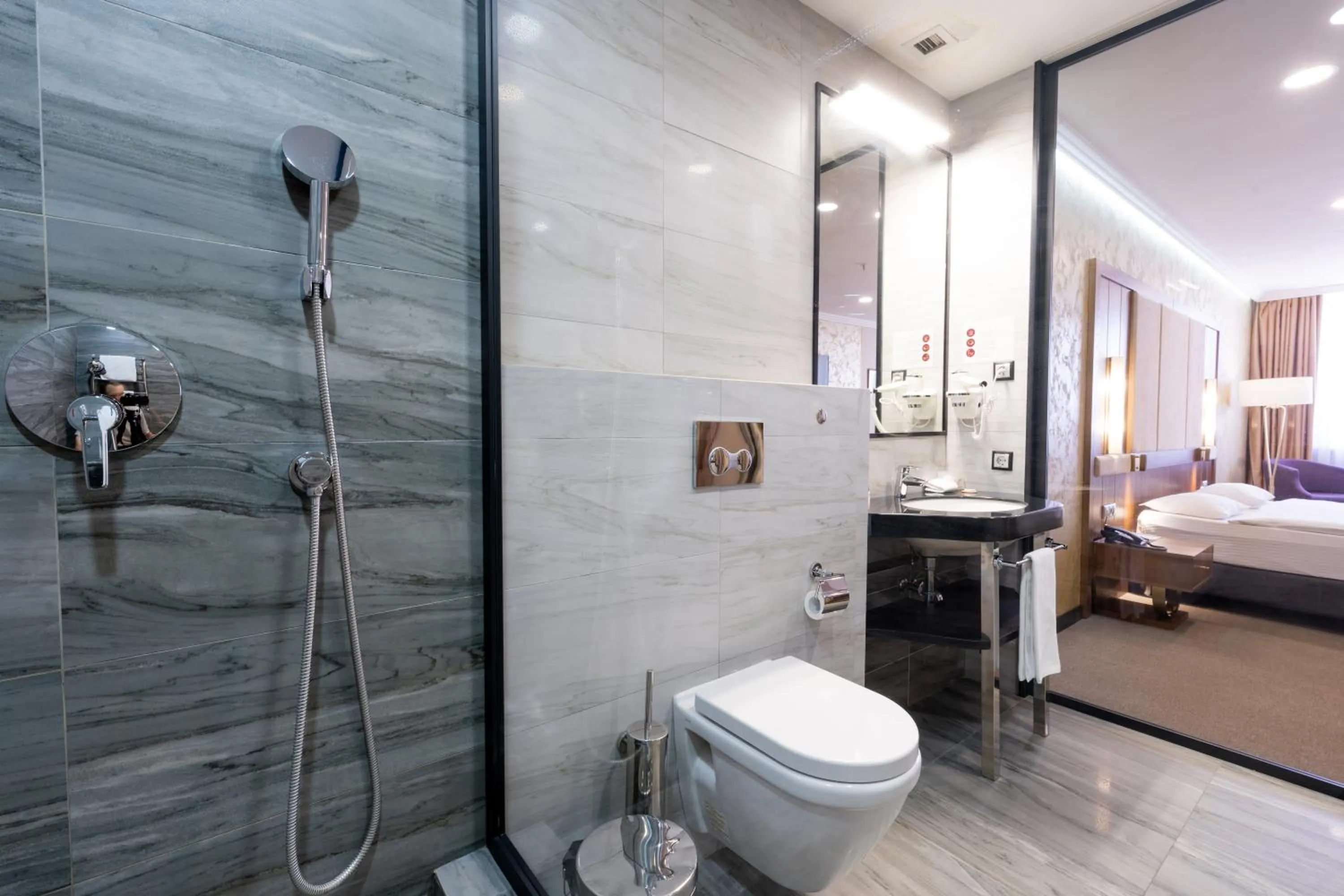 Shower, Bed in Reikartz Sky Almaty