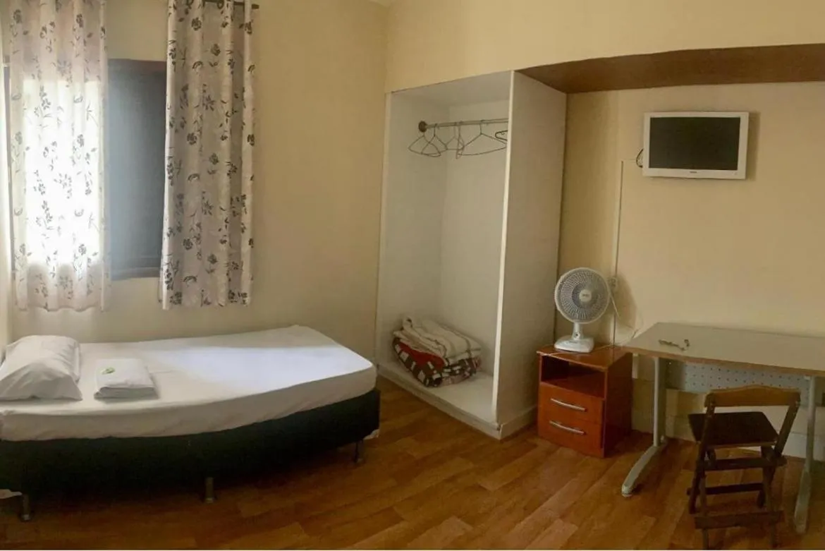 Bed in Hotel Pousada Ibituruna inn