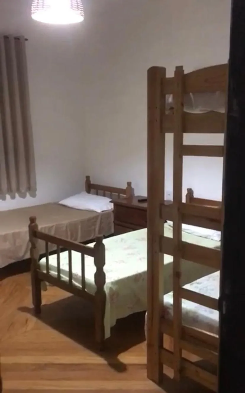 Bed in Hotel Pousada Ibituruna inn