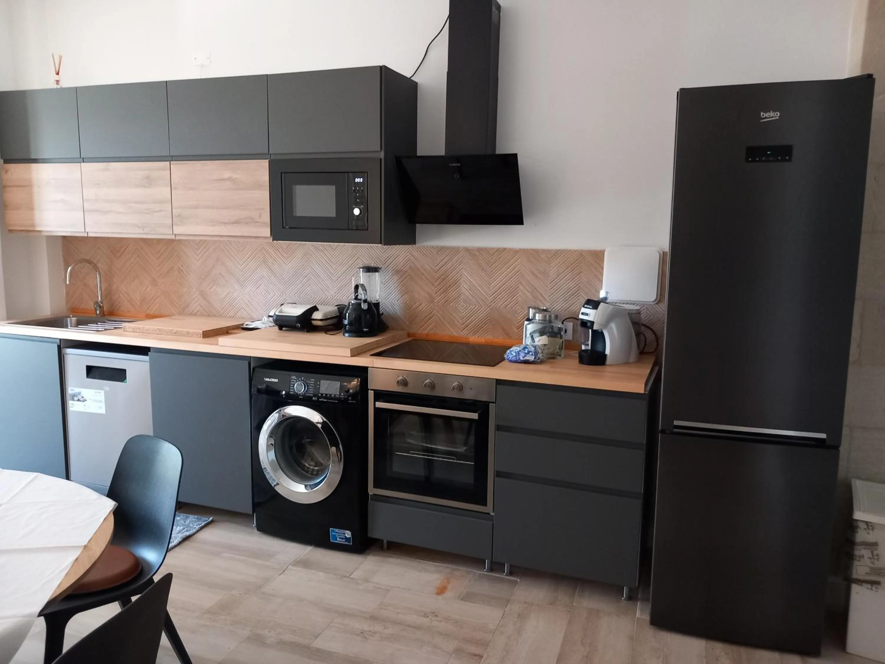 Kitchen or kitchenette in Aparthotel Masseria Villa Marchesi