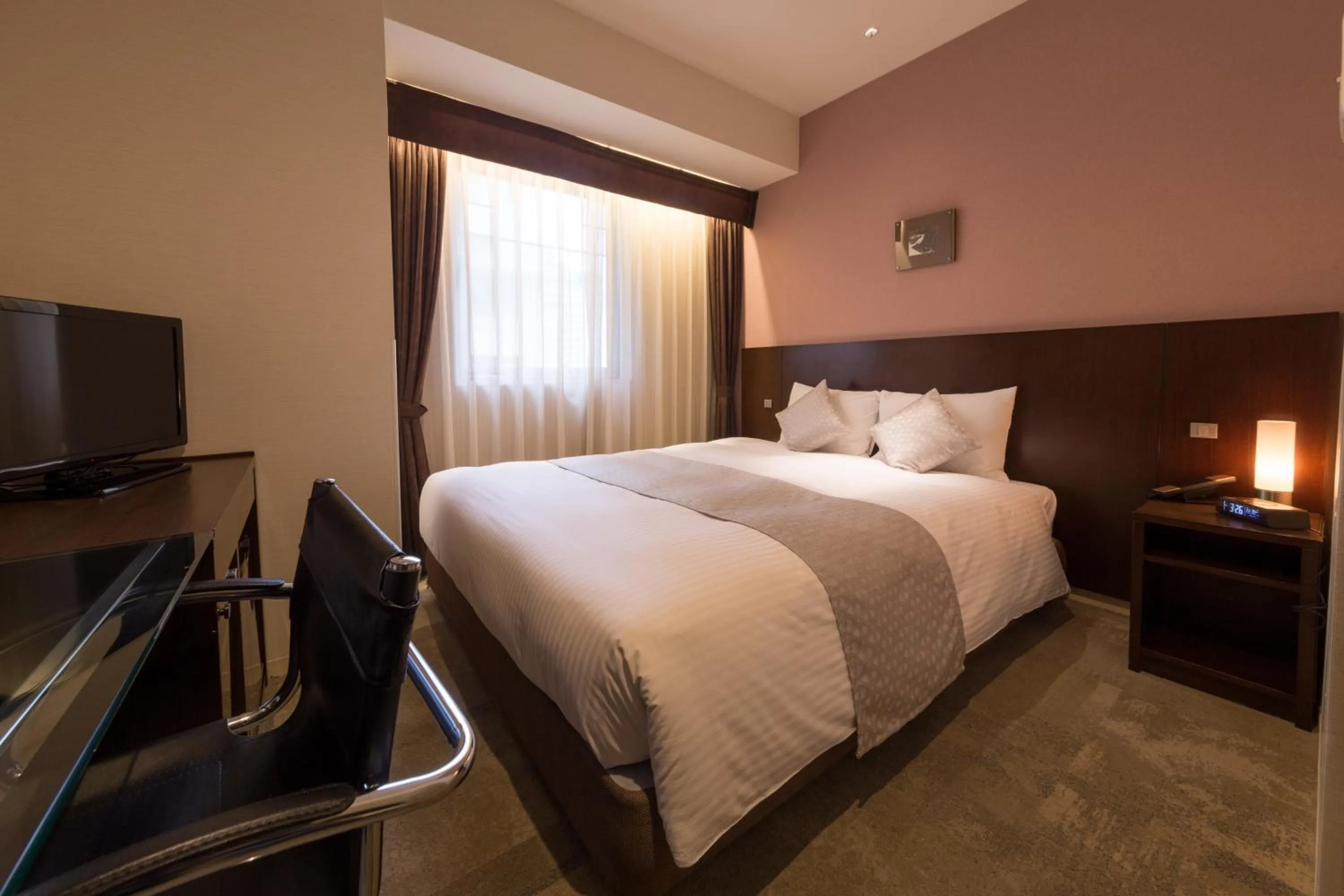 Bed in Hotel Tenjin Place