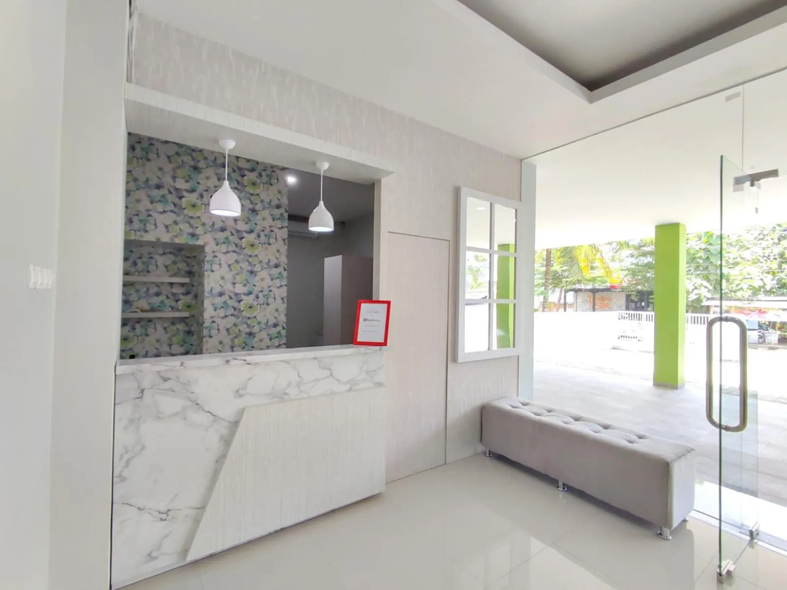 Bed in RedDoorz Syariah near GOR Satria Area