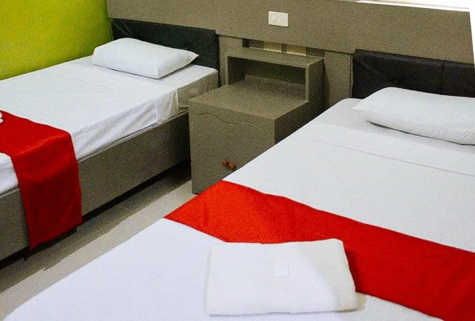Bed in RedDoorz at EM Pensiontel Butuan City