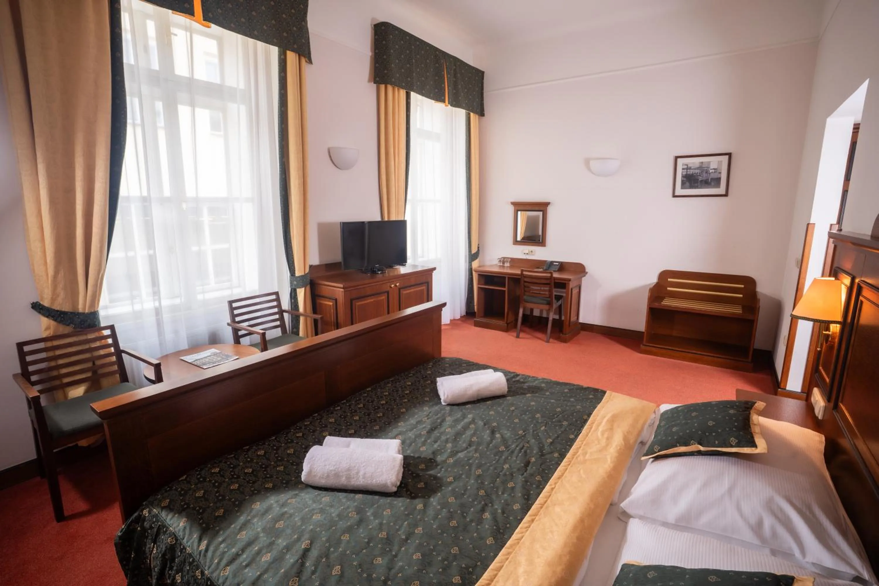 Bedroom, Bed in U Medvidku-Brewery Hotel