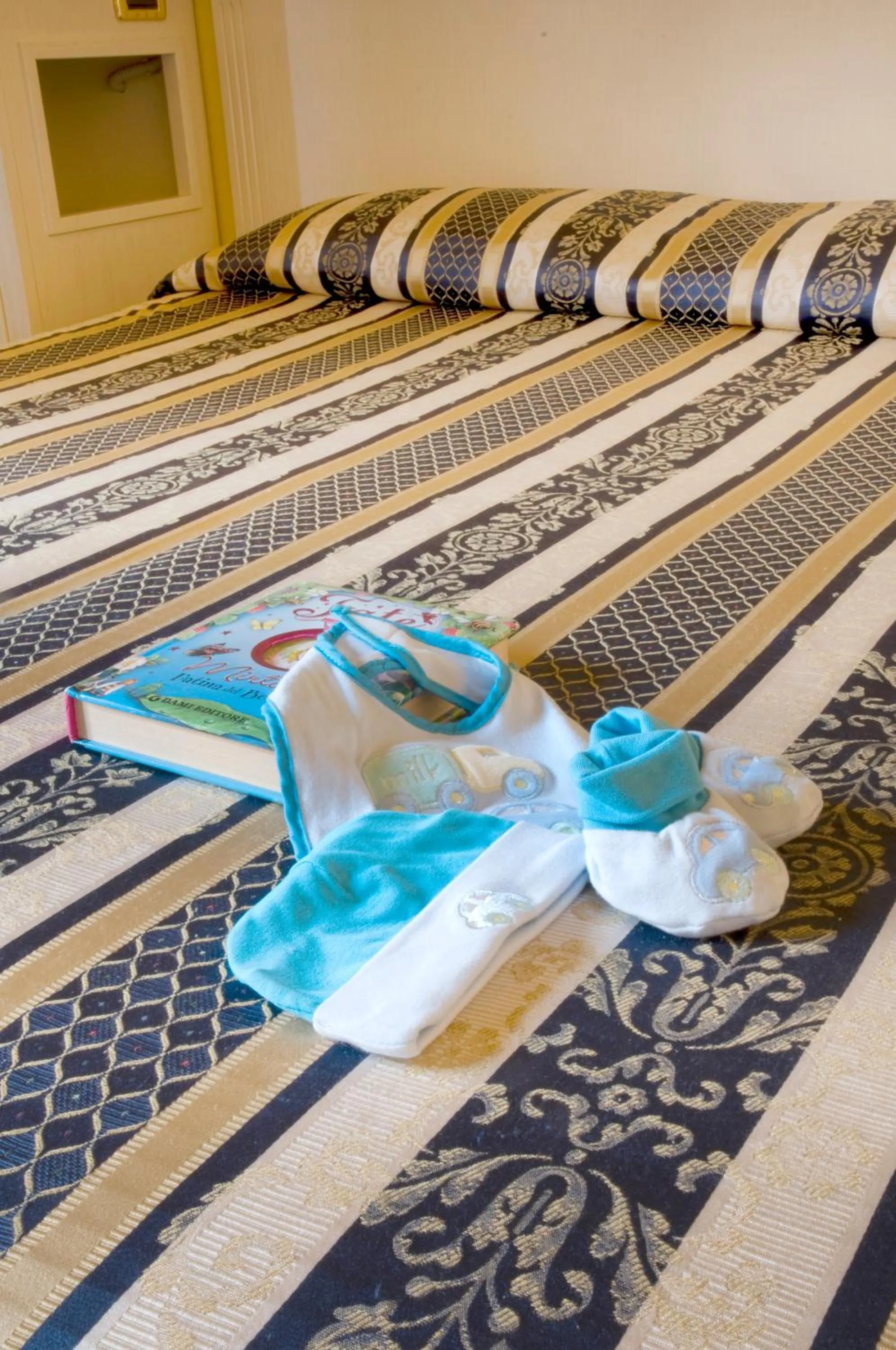 Decorative detail, Bed in Albergo Milano