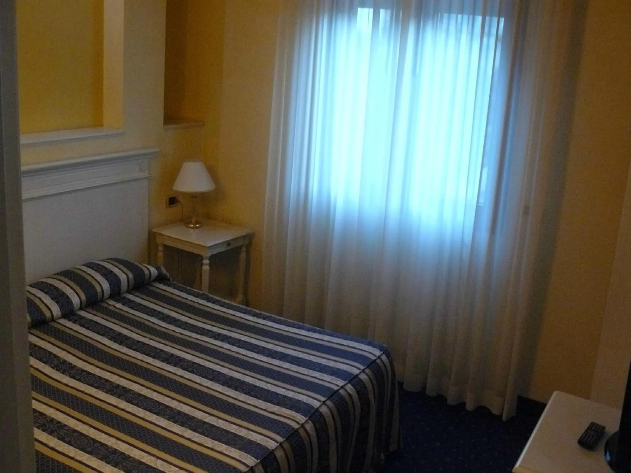 Bed in Albergo Milano