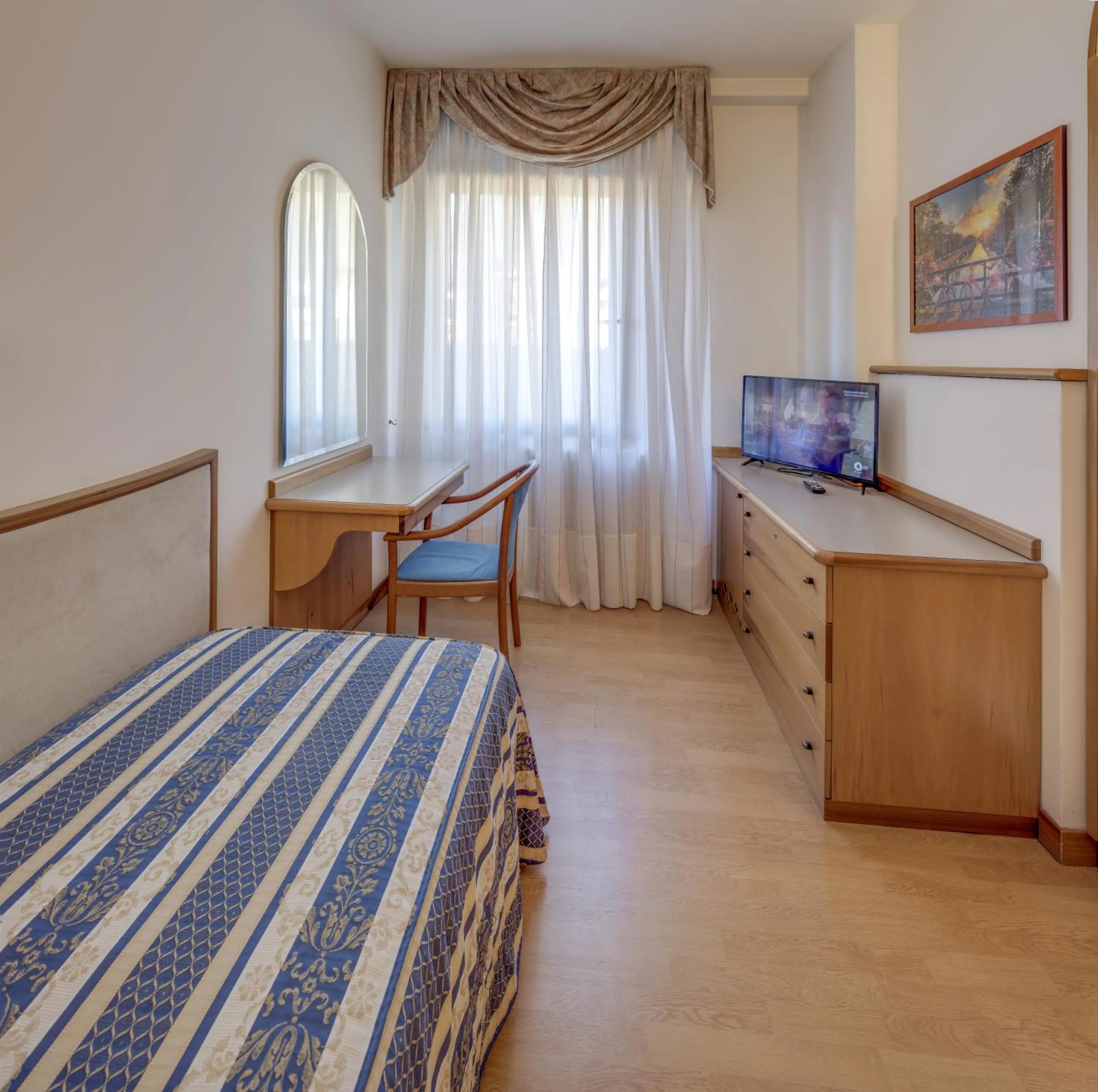 Bed in Albergo Milano