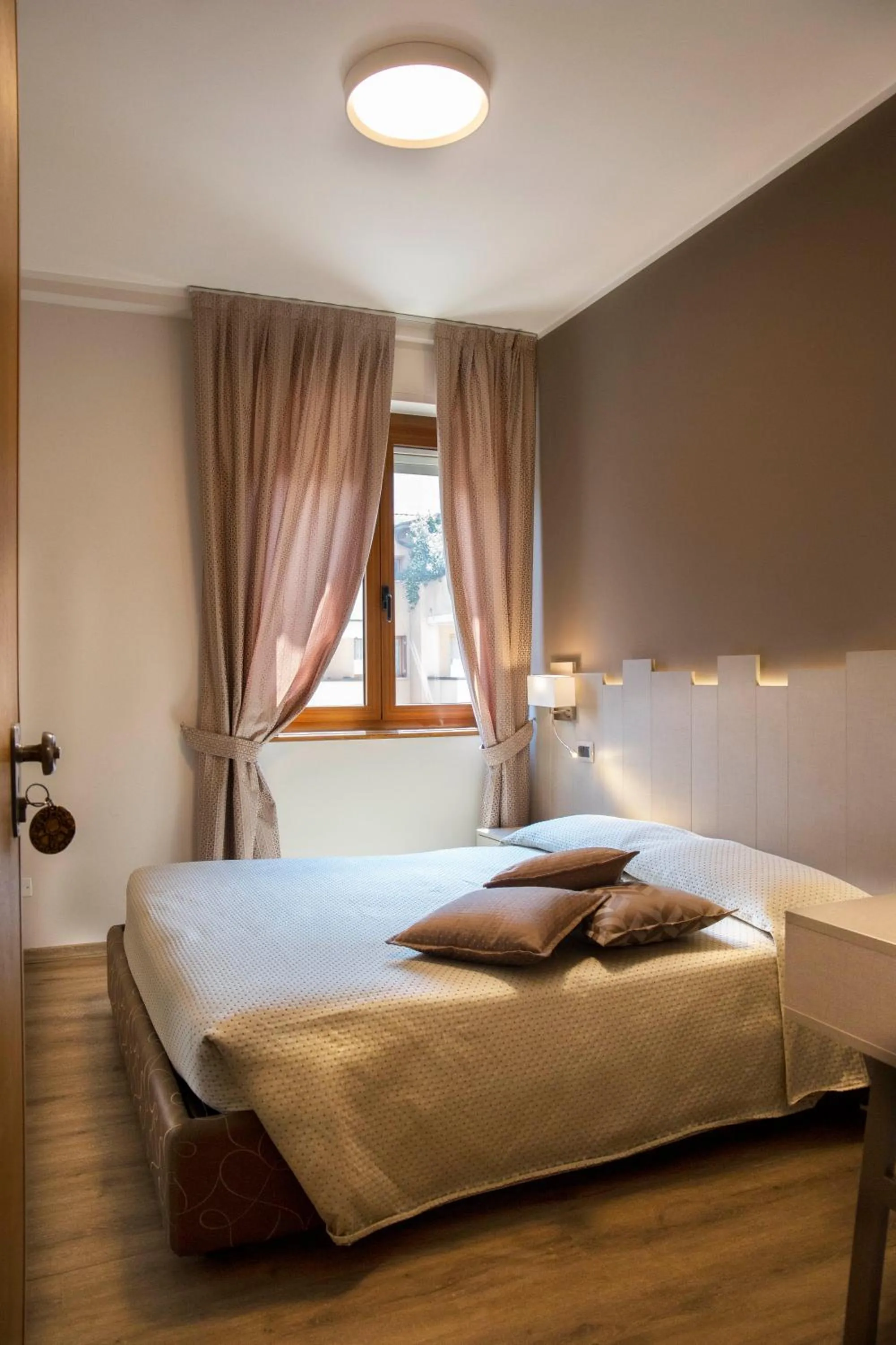 Bed in Albergo Milano