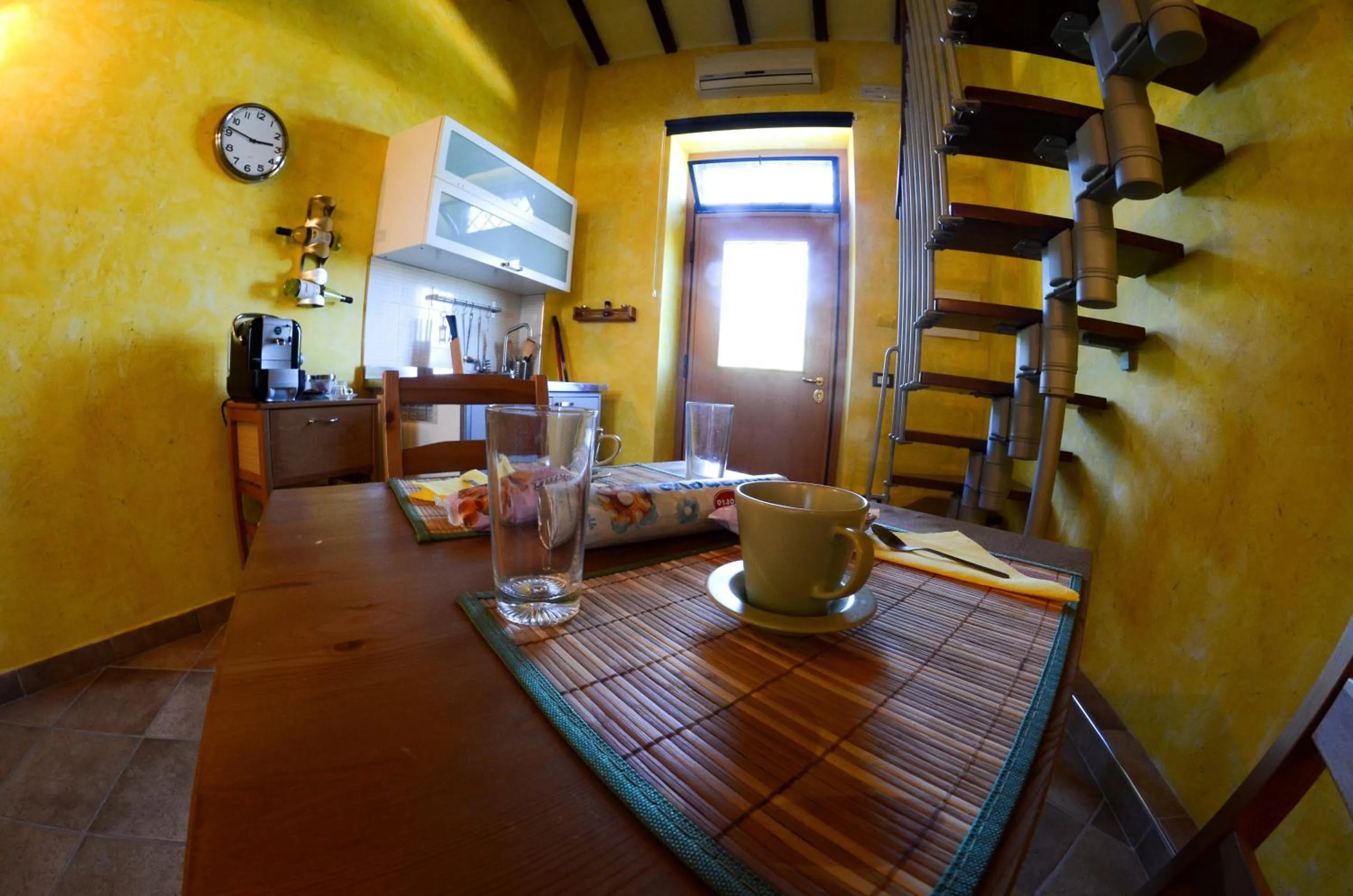 Kitchen or kitchenette in Le Suite Bracciano