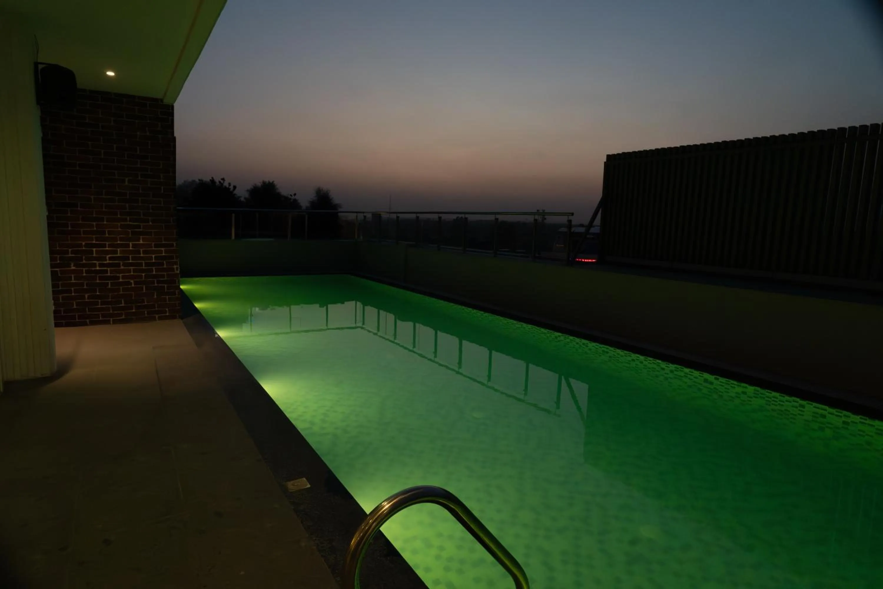 Night, Swimming Pool in Regenta Place Amritsar by Royal Orchid Hotels Limited