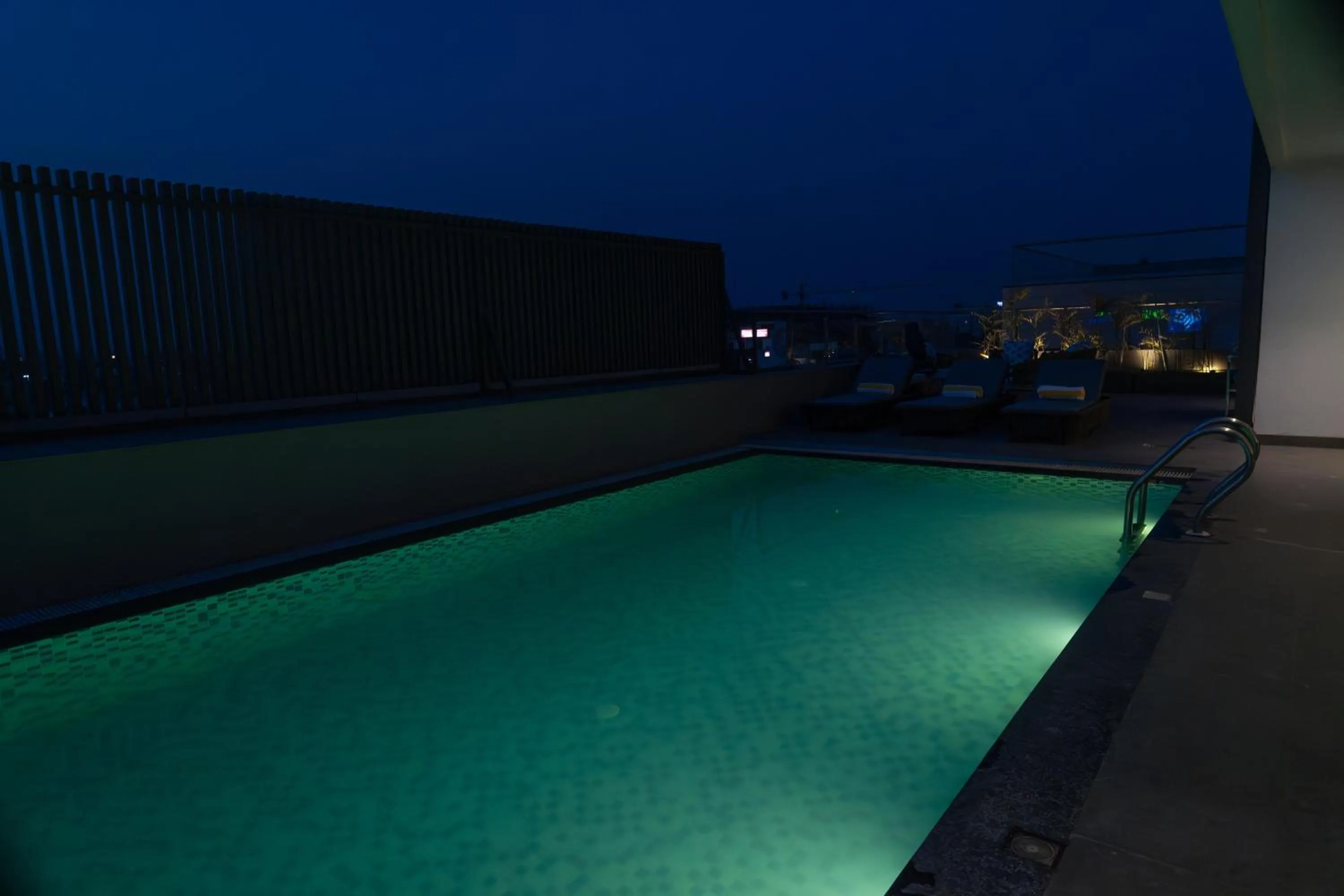 Night, Swimming Pool in Regenta Place Amritsar by Royal Orchid Hotels Limited