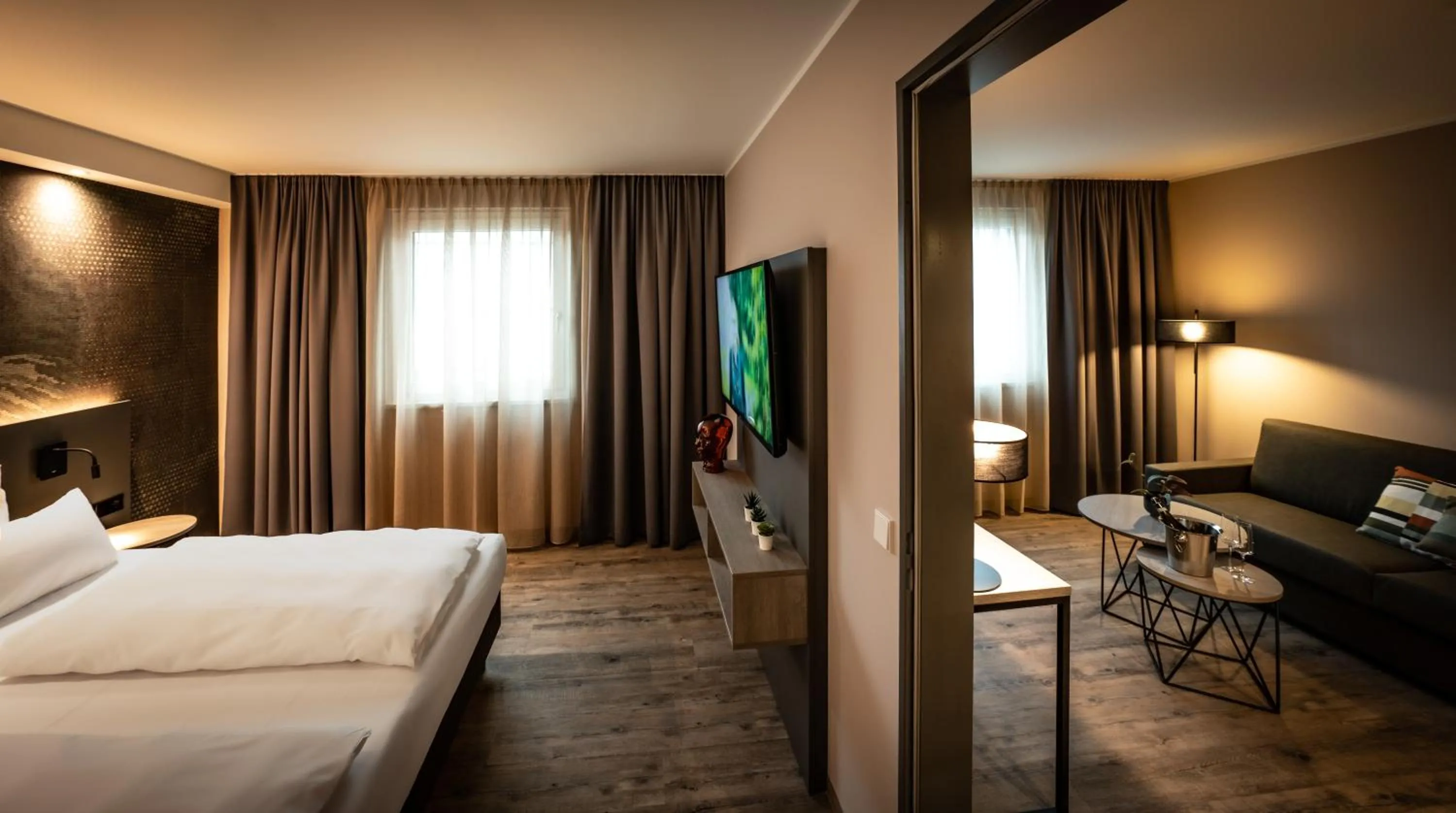 Photo of the whole room, Bed in LOGINN Hotel Stuttgart Zuffenhausen