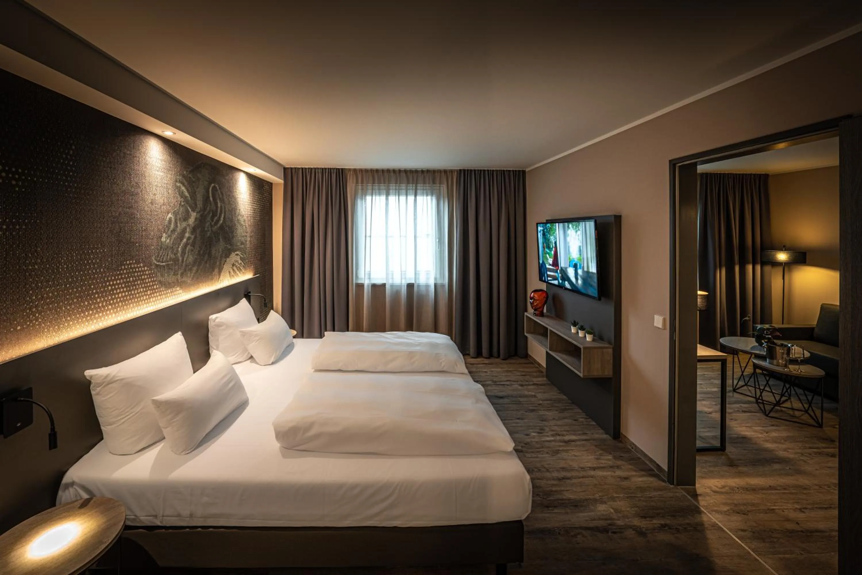 Photo of the whole room, Bed in LOGINN Hotel Stuttgart Zuffenhausen