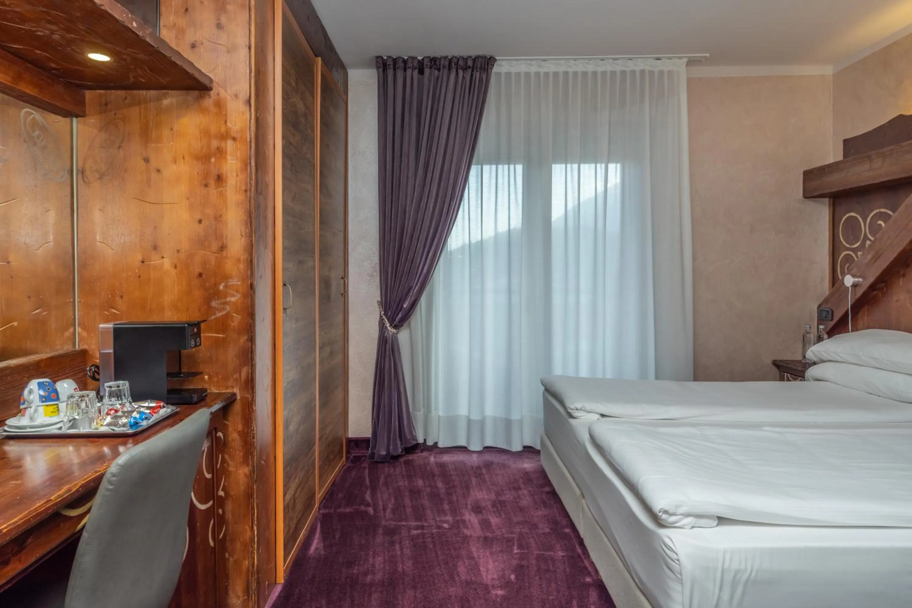 Bed in Garden Wellness Hotel S