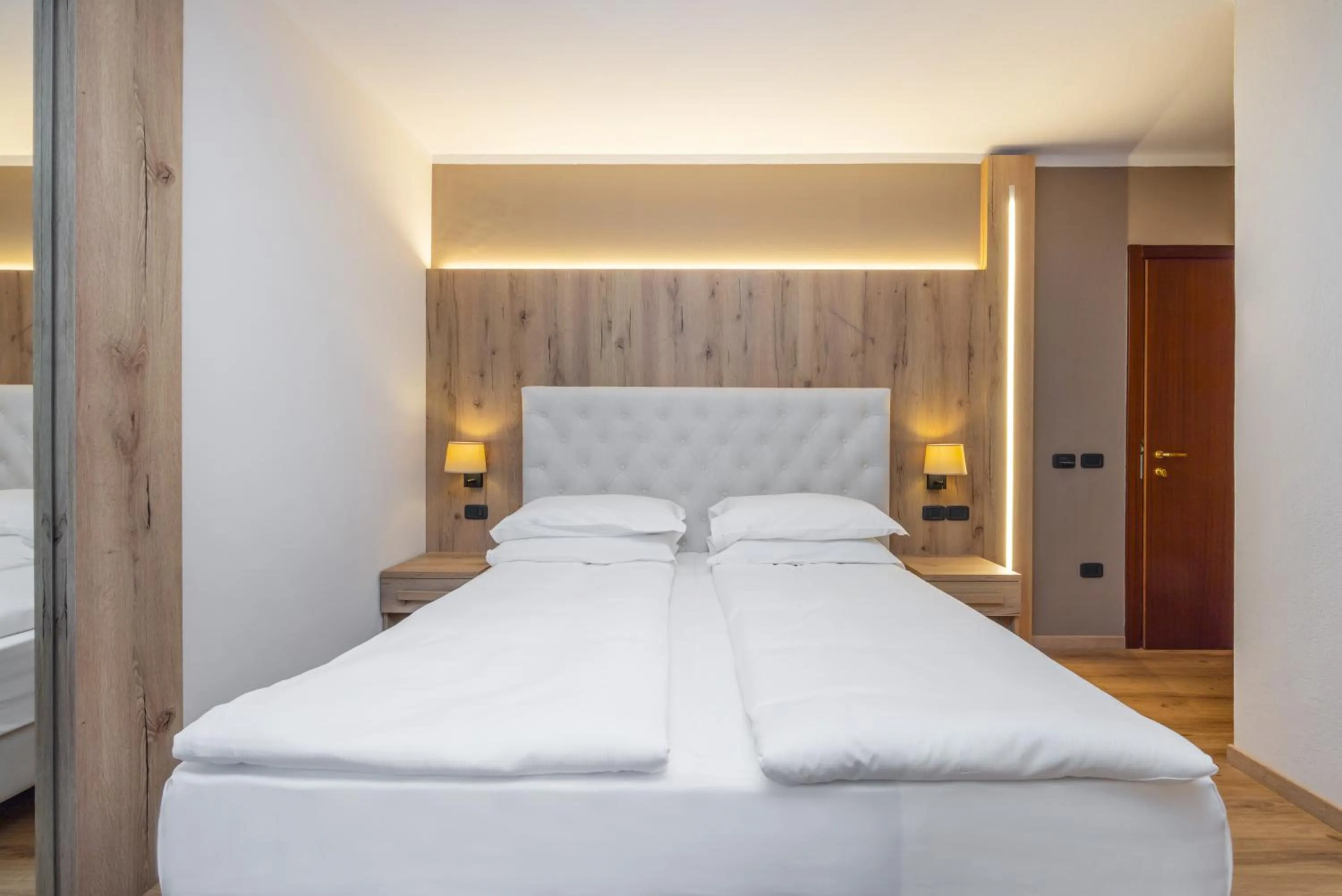 Bed in Garden Wellness Hotel S