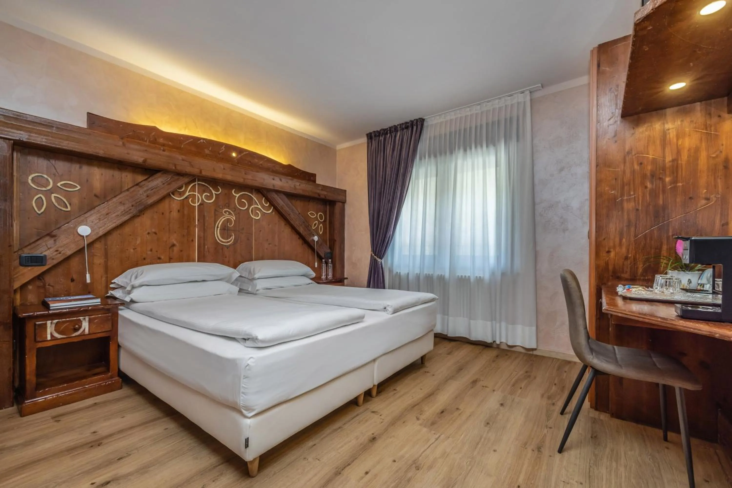 Bed in Garden Wellness Hotel S