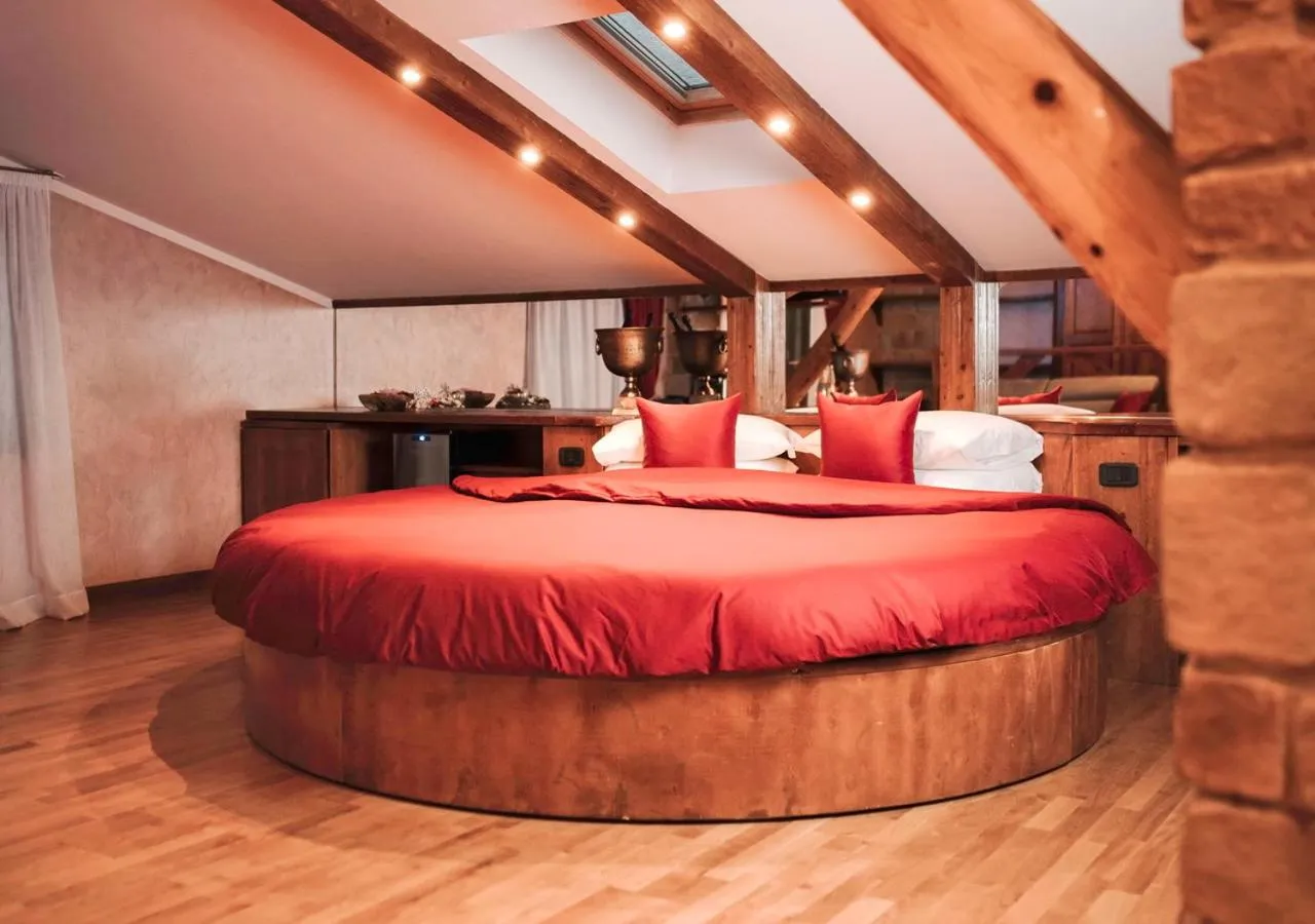 Bed in Garden Wellness Hotel S