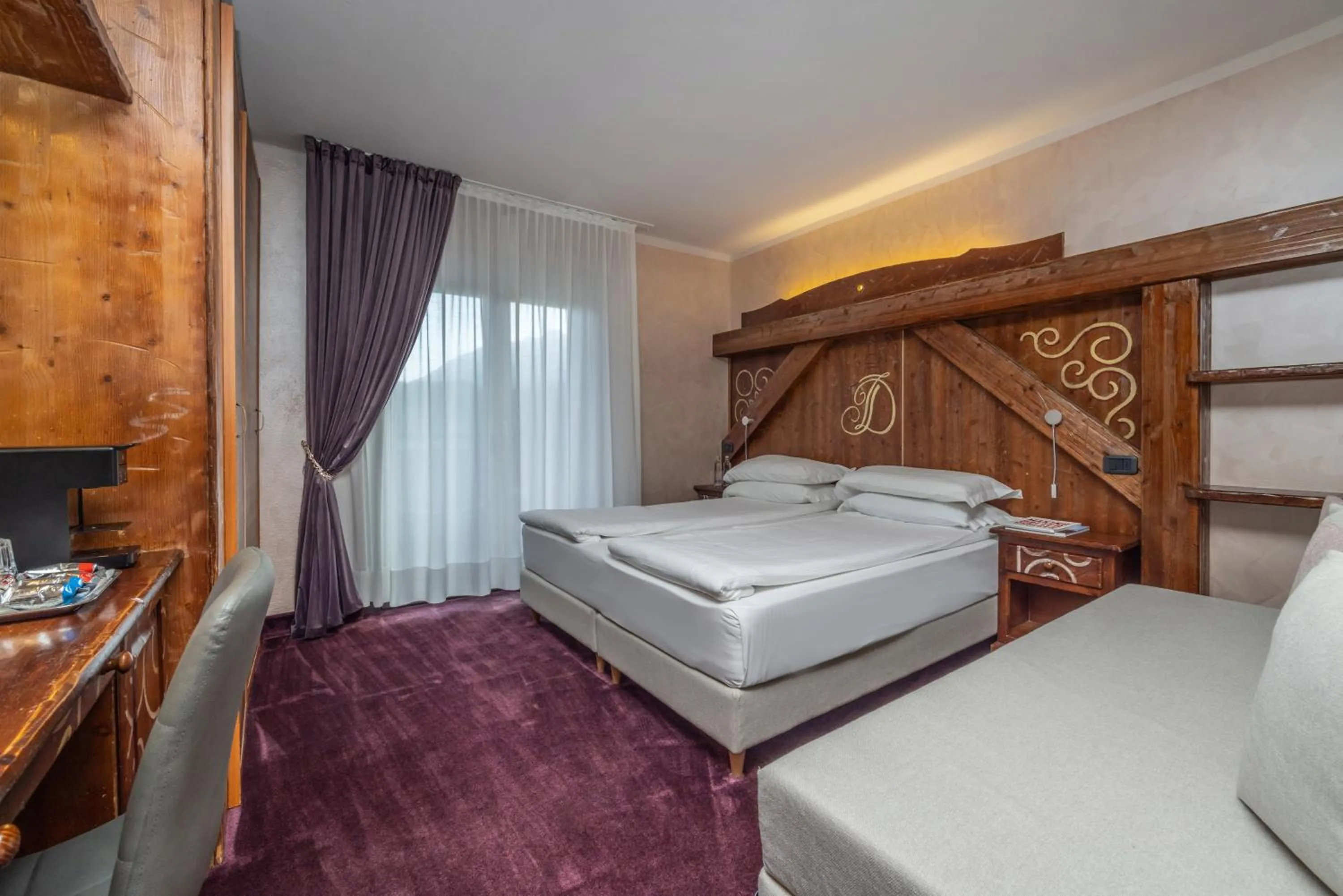 Bed in Garden Wellness Hotel S