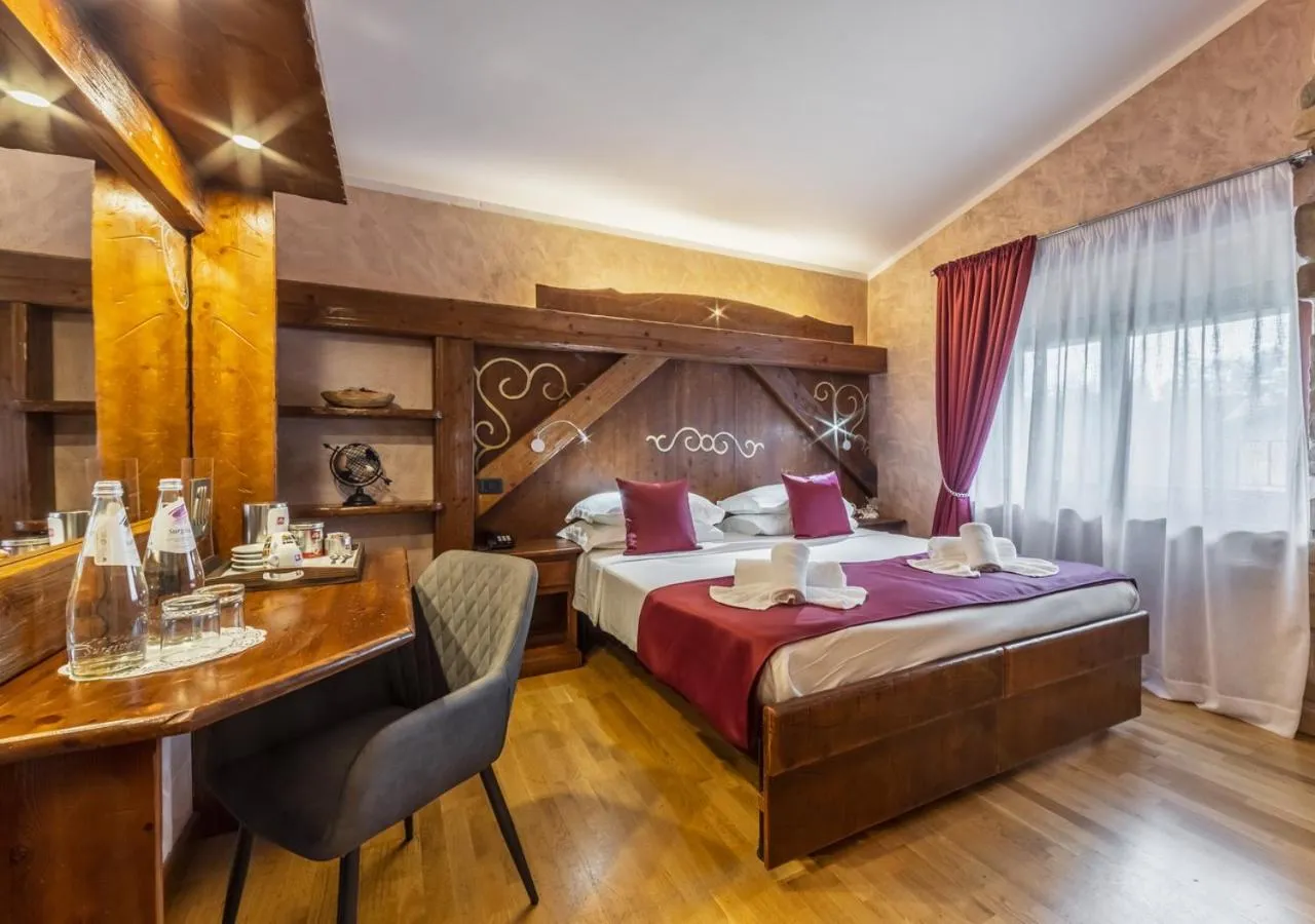 Bed in Garden Wellness Hotel S