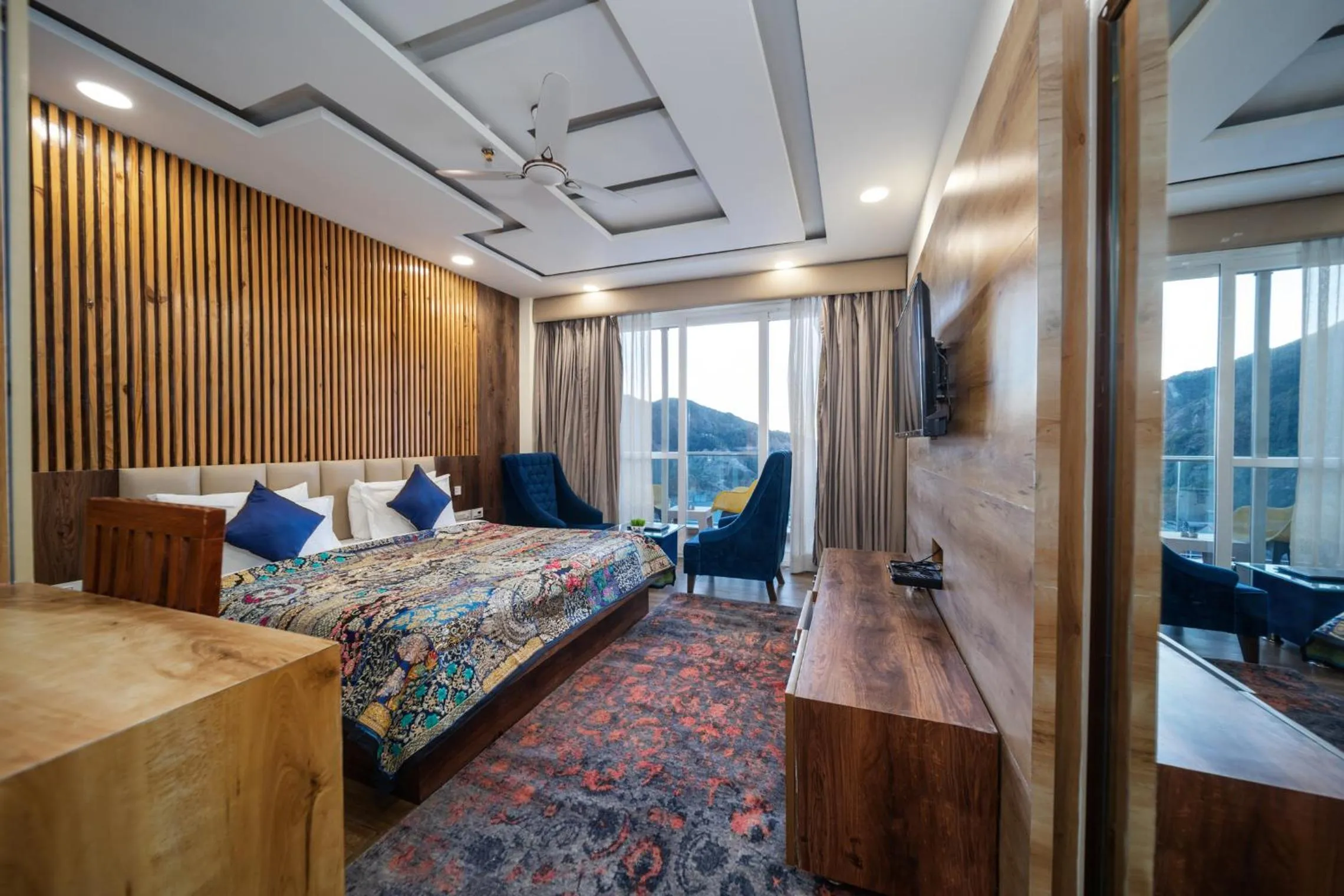 Bed in Tripli Hotels Shivaay
