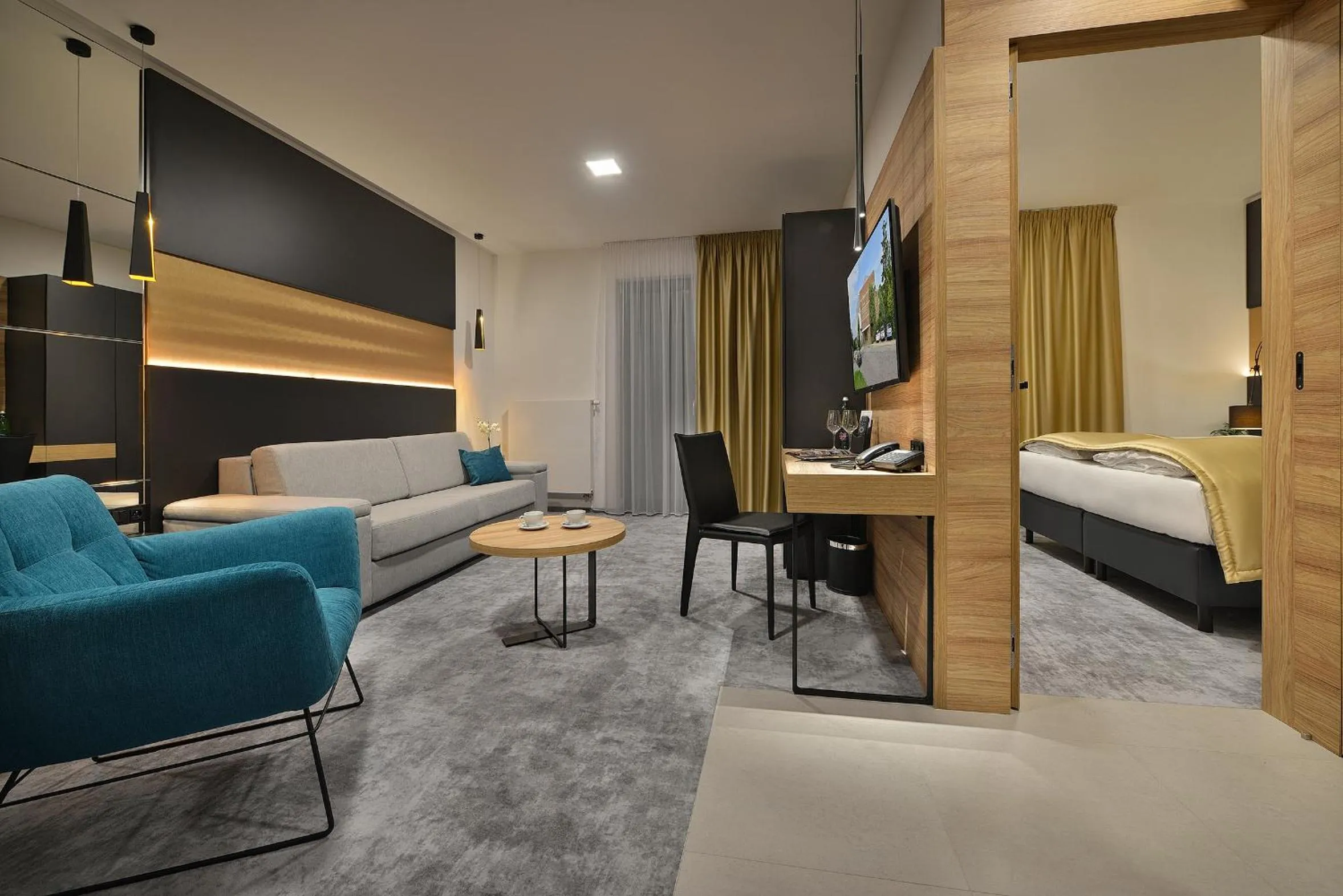 Living room, Bed in PREMIUM Wellness & Wine Hotel Znojmo