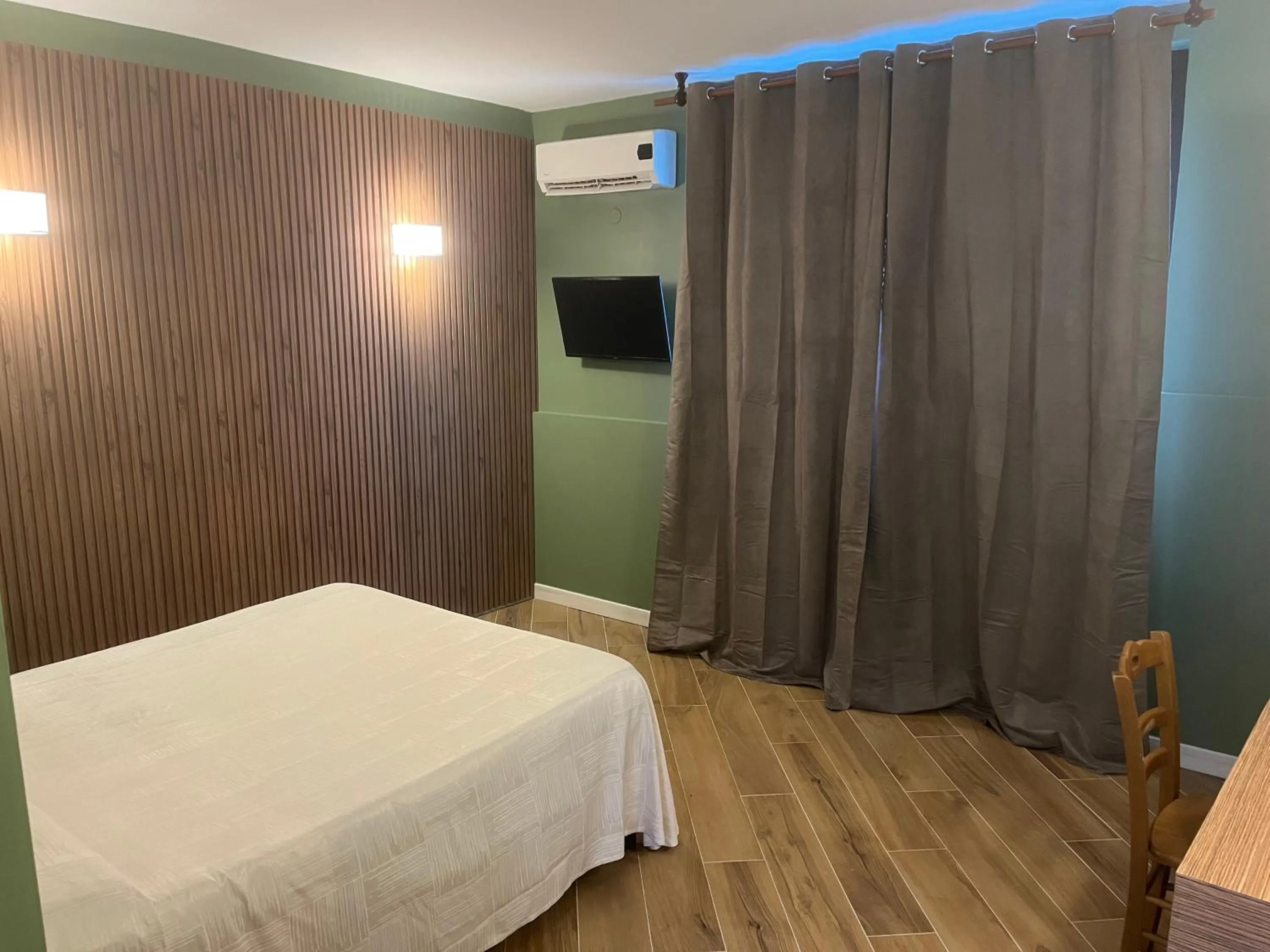 Bed in Hotel Ginepro